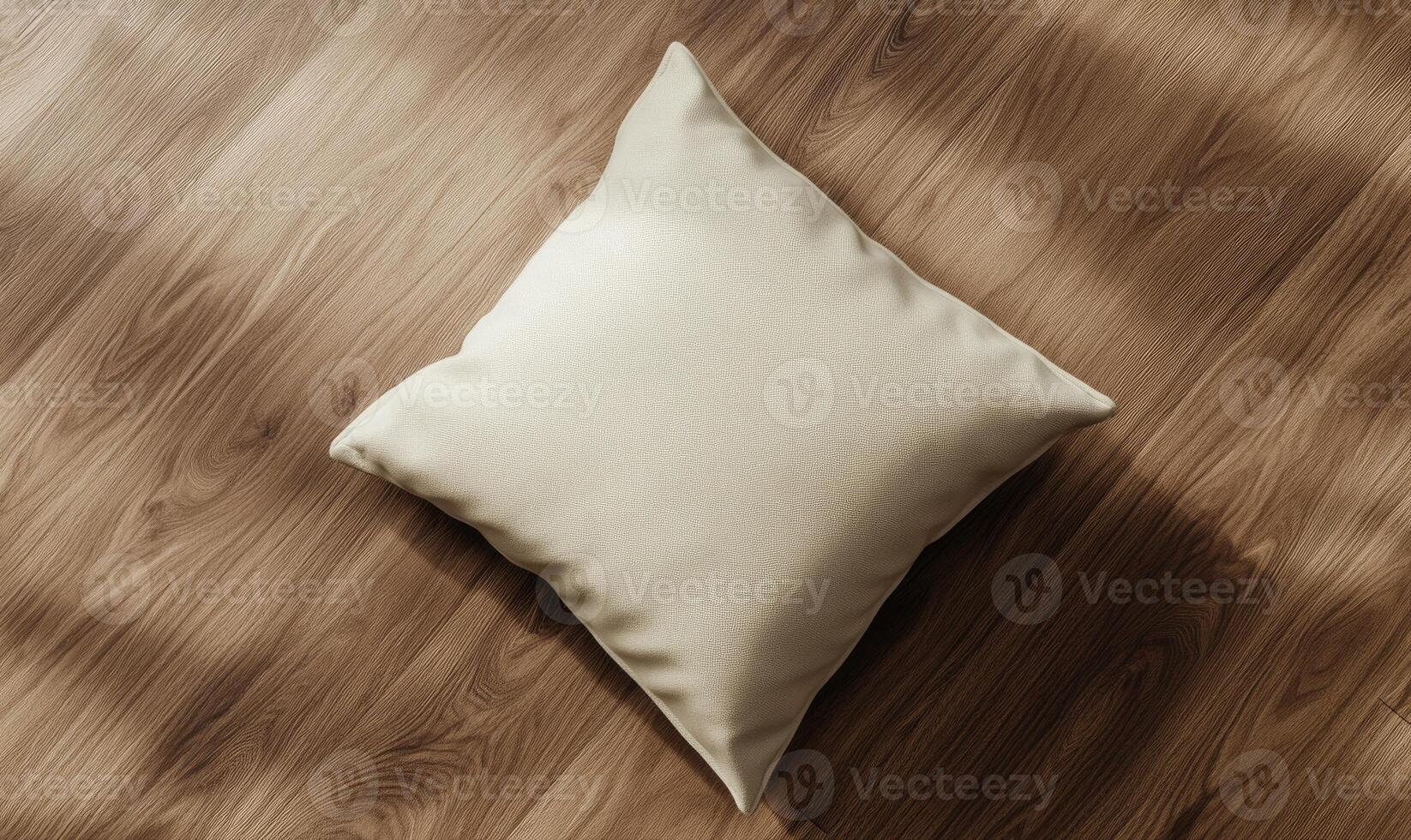a pillow on a wooden floor photo