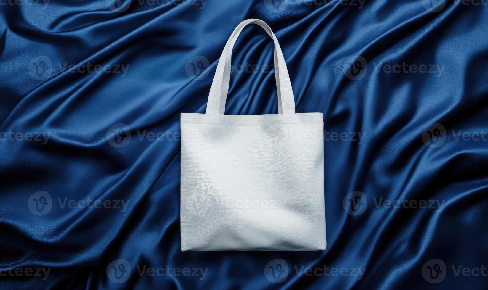 A white bag mockup on a blue background photo