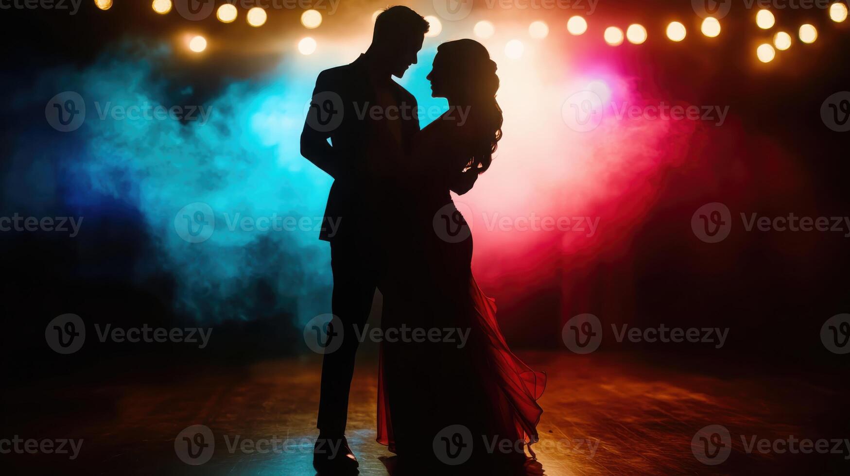 Dramatic silhouette of a dancing couple under cinematic lighting. photo