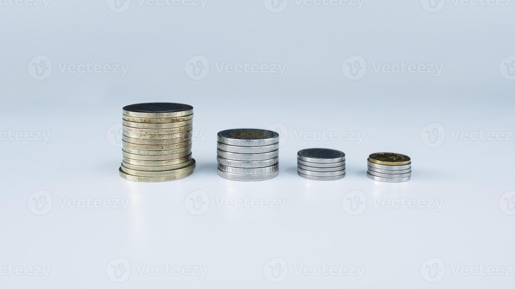Stacked Coins Arranged by Increasing Height photo