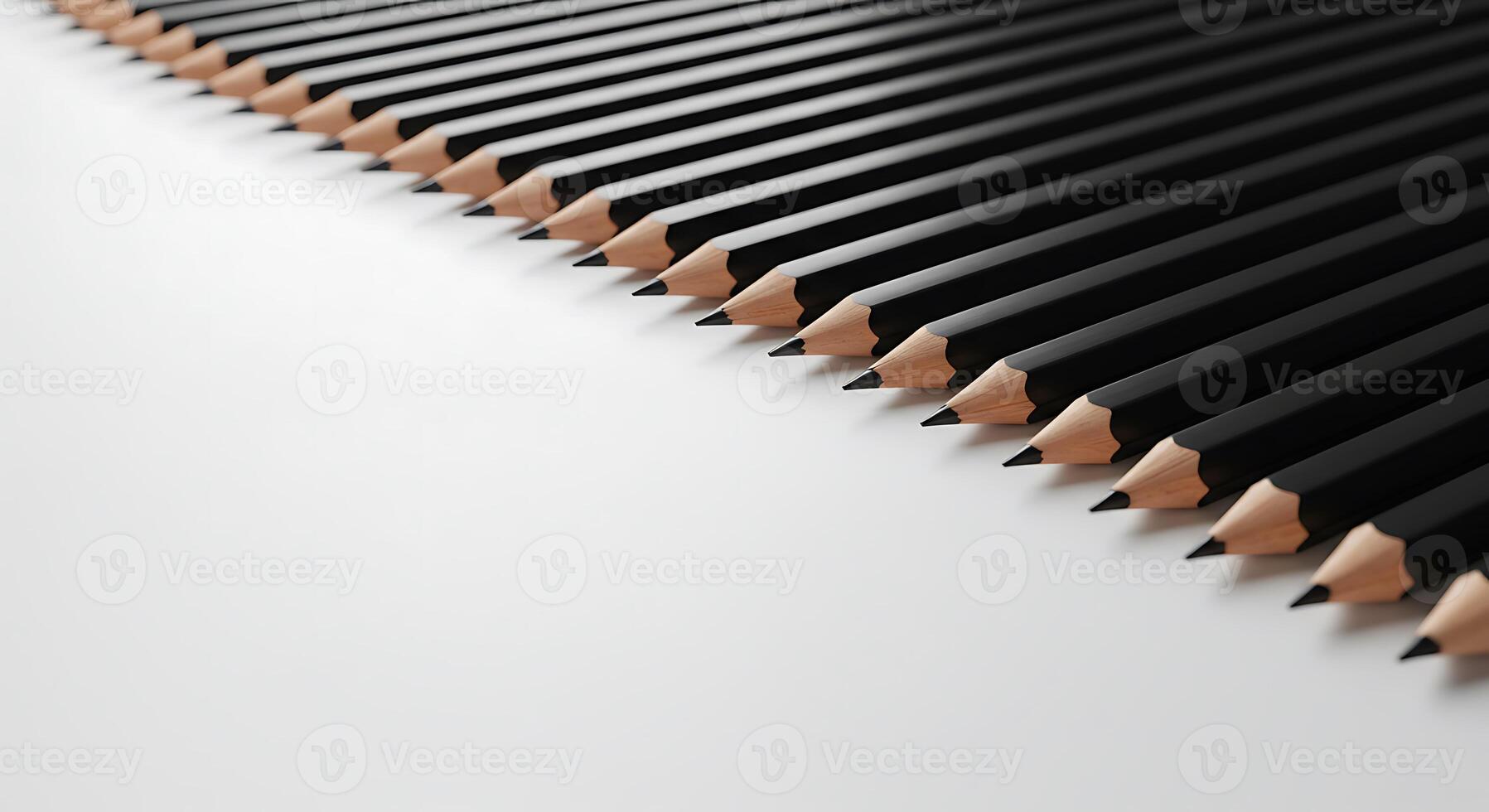 Arrangement of Black Pencils on White Surface Creates a Minimalist Pattern photo