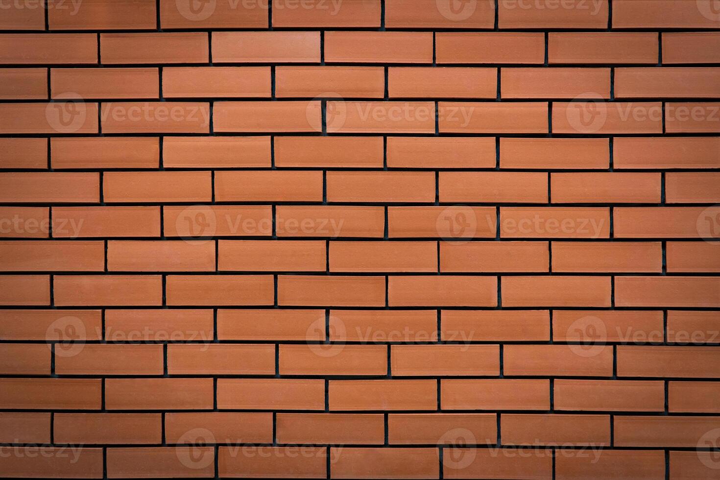 Abstract seamless texture of orange brick wall for blackground, backdrop, wallpaper, coverbook and decoration. photo