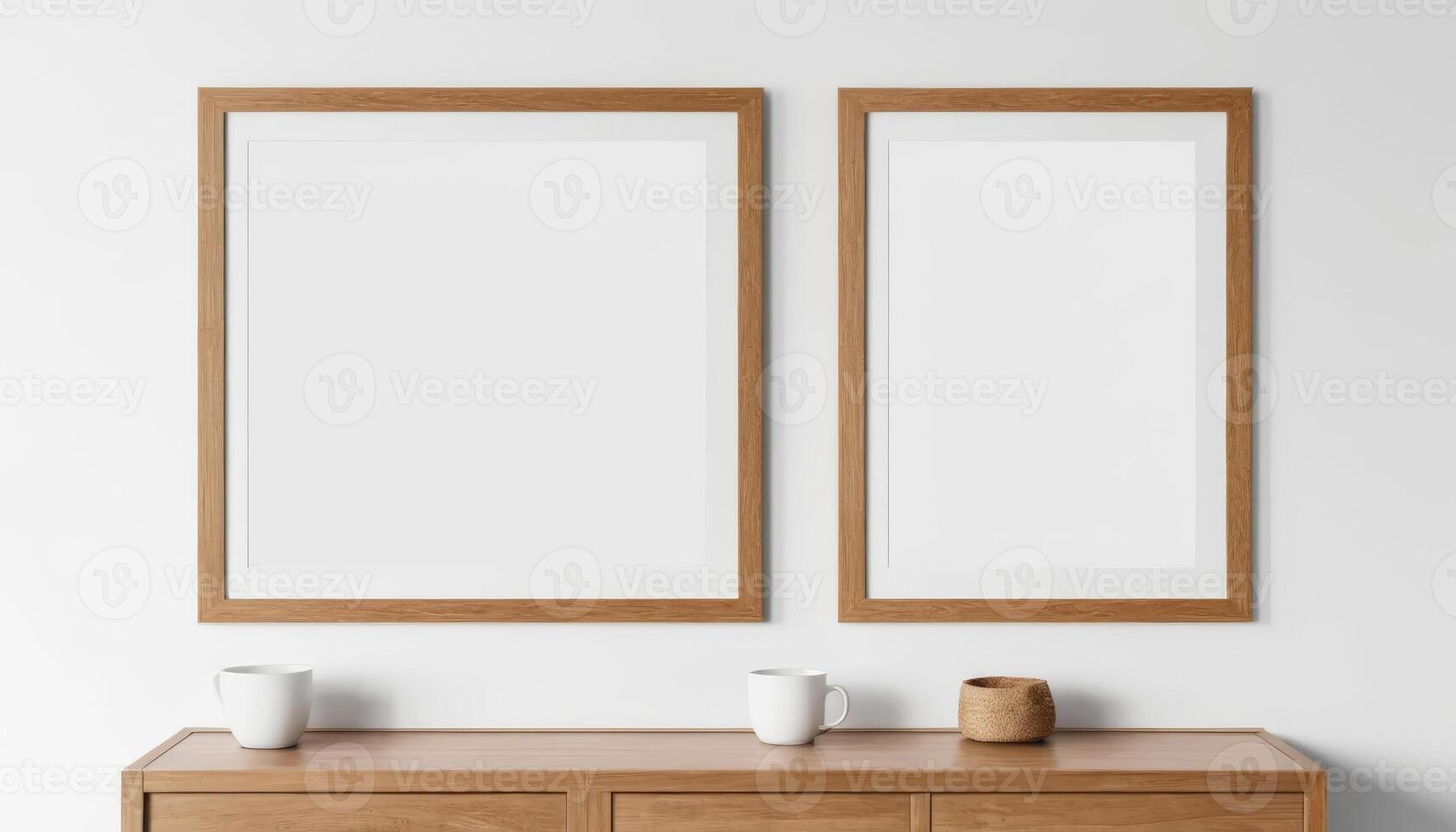 Two empty, minimalist picture frames in a light wood finish, placed on a simple shelf, ideal for modern or Scandinavian interior wall decor photo