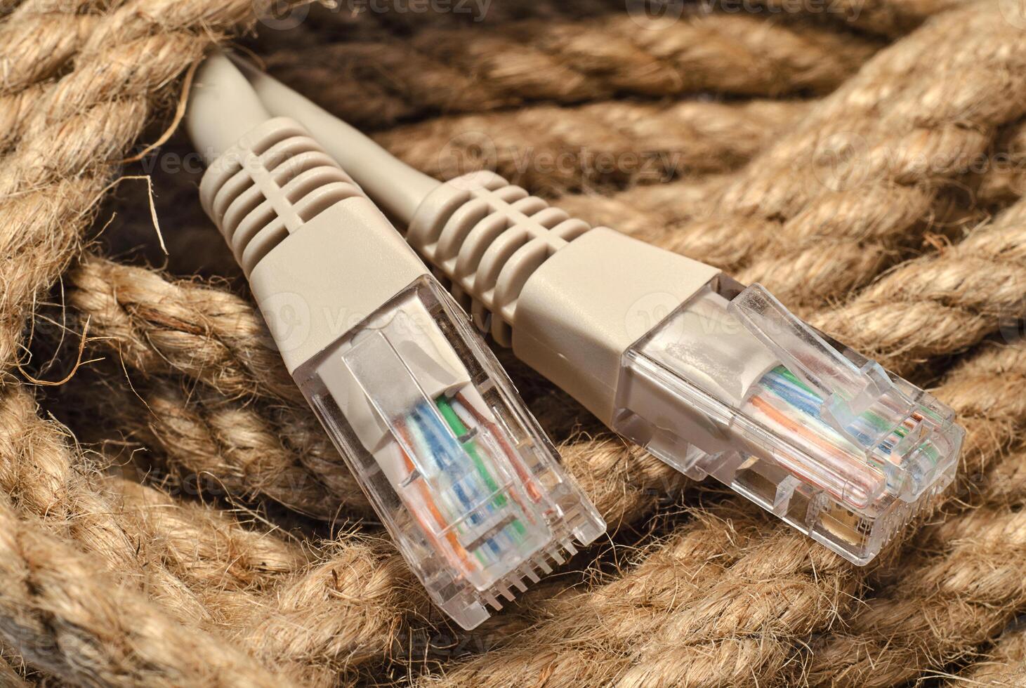 Patch cord of network cable on rope skein closeup internet conception photo