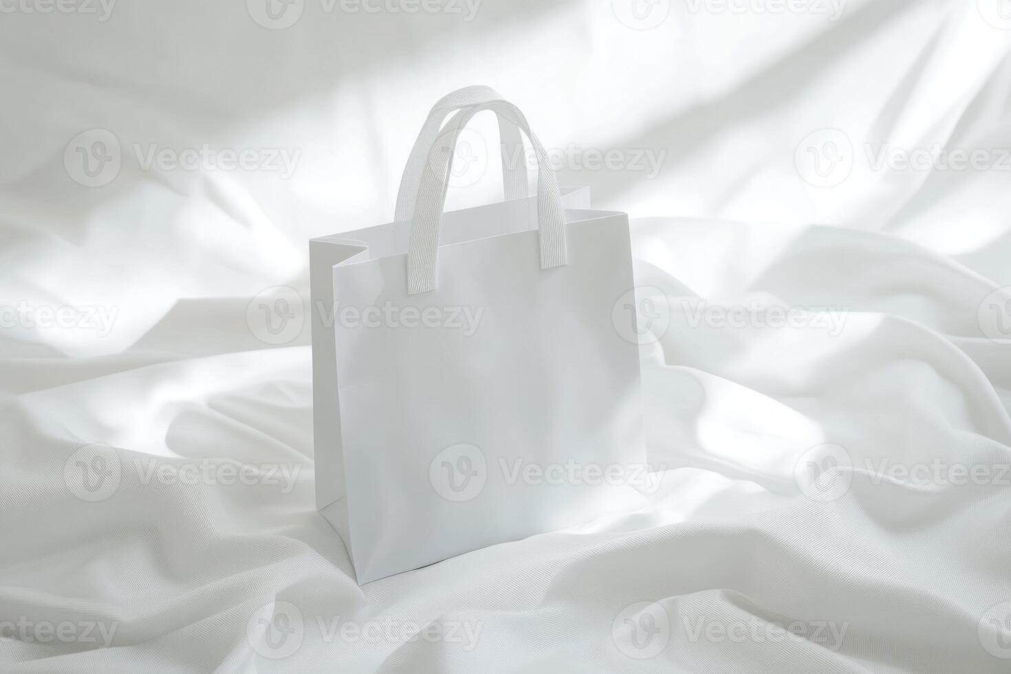 White paper bag on white background photo