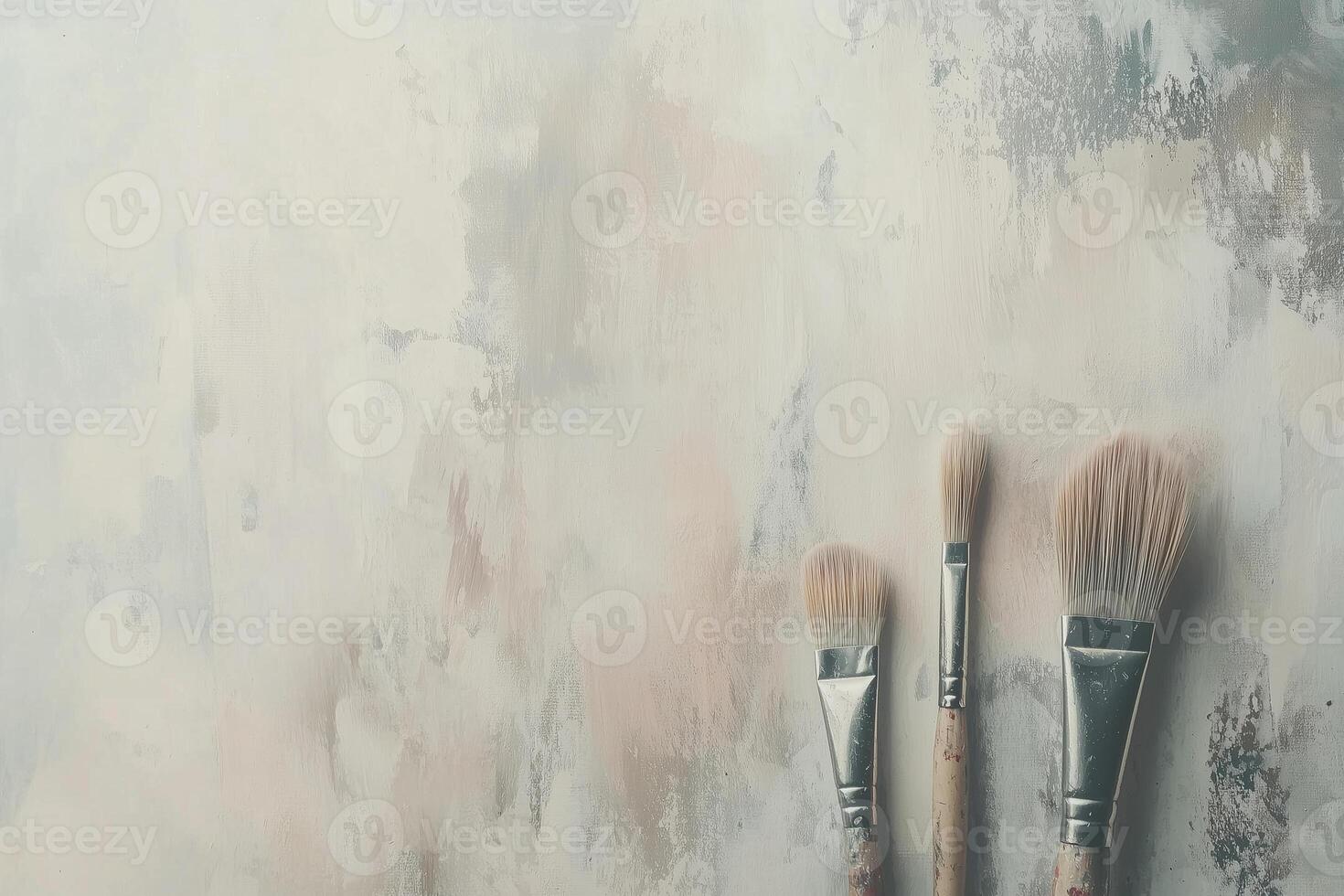 Paintbrushes and canvas arranged on a neutral background ready for creative expression and artistic exploration photo