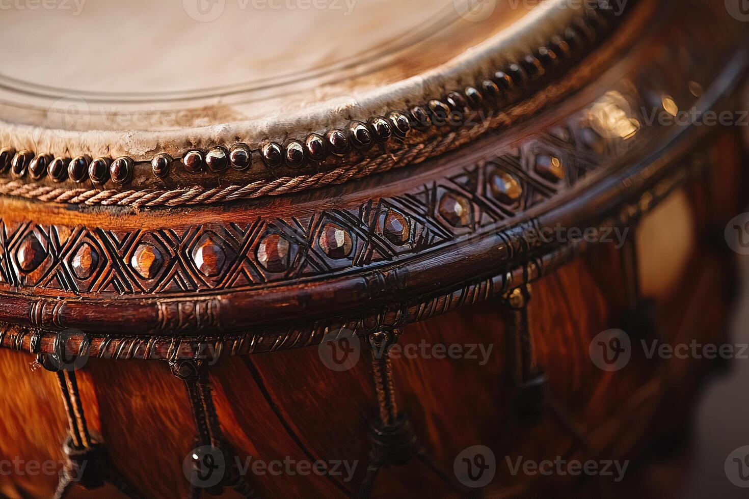 Close-up traditional Indian tabla, showcasing intricate wood grain and finely textured drum skin. soft lighting enhances craftsmanship and cultural significance of classical percussion instrument. photo