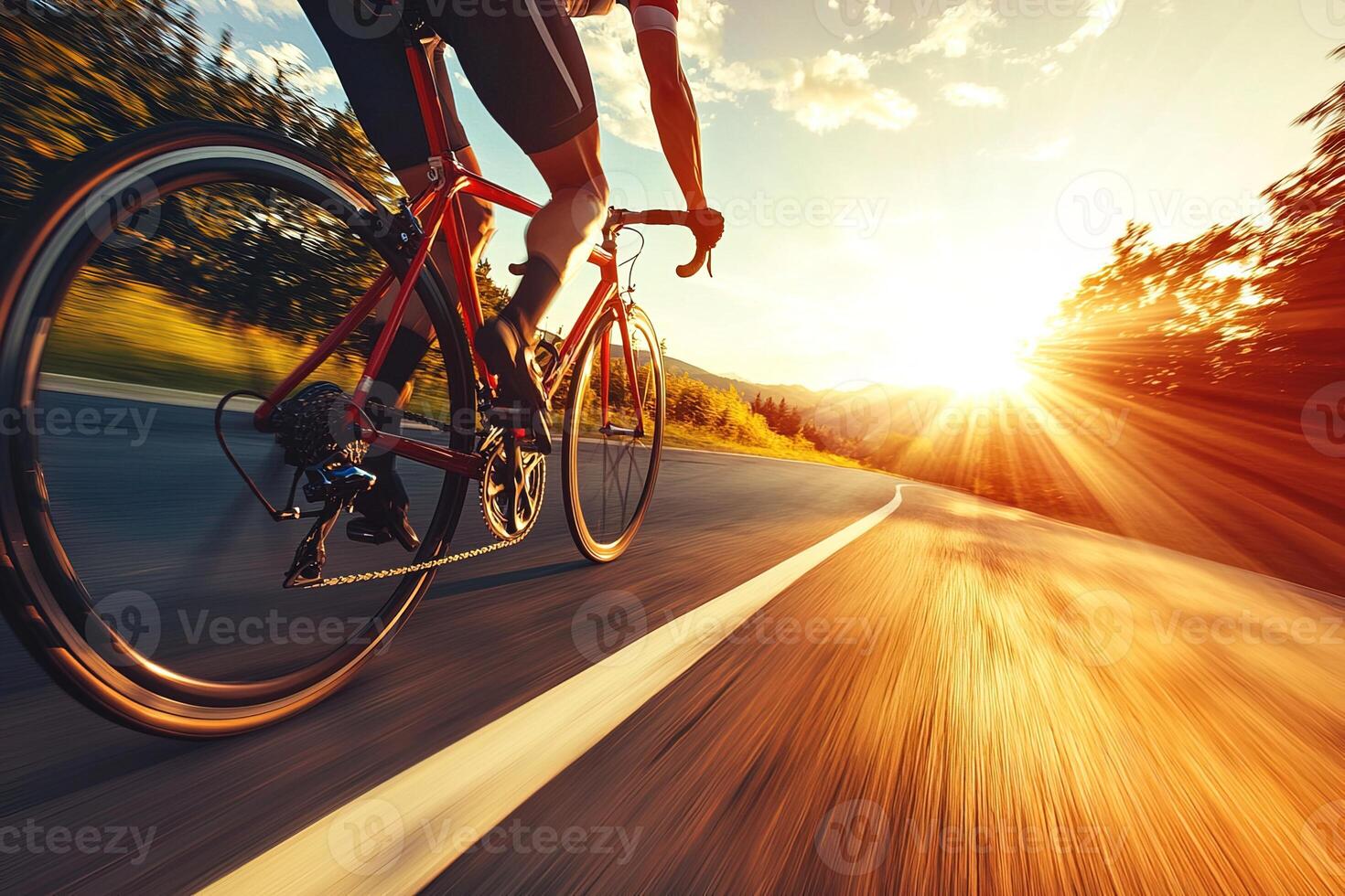 bottom view cyclist riding bicycle very fast on mountain road, high speed with motion blur, extreme sport in sunset light photo