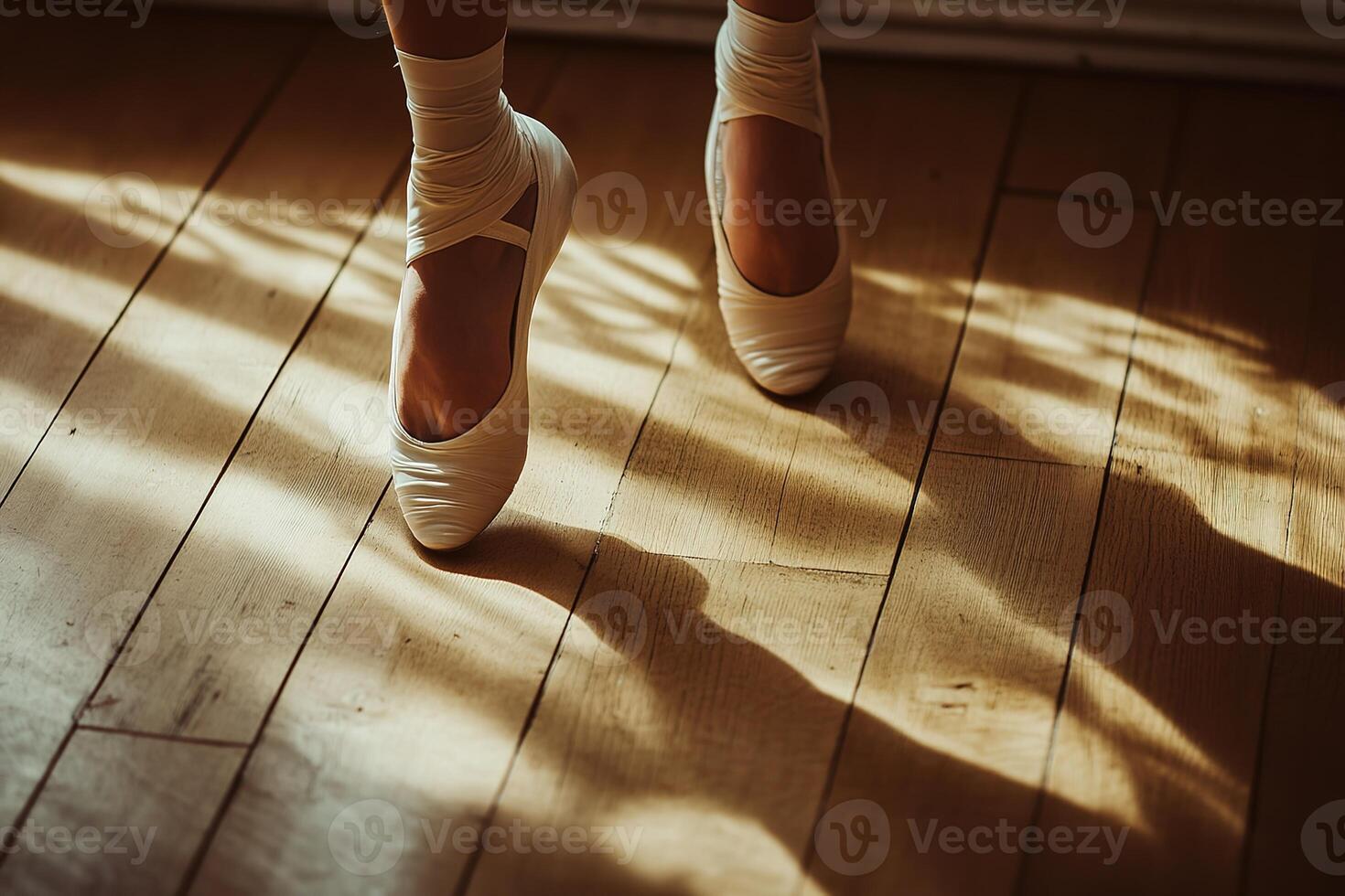 close-up photo of a ballet dancer's feet in pointe shoes, soft ribbons elegantly tied, dancing on a polished wooden floor, natural lighting