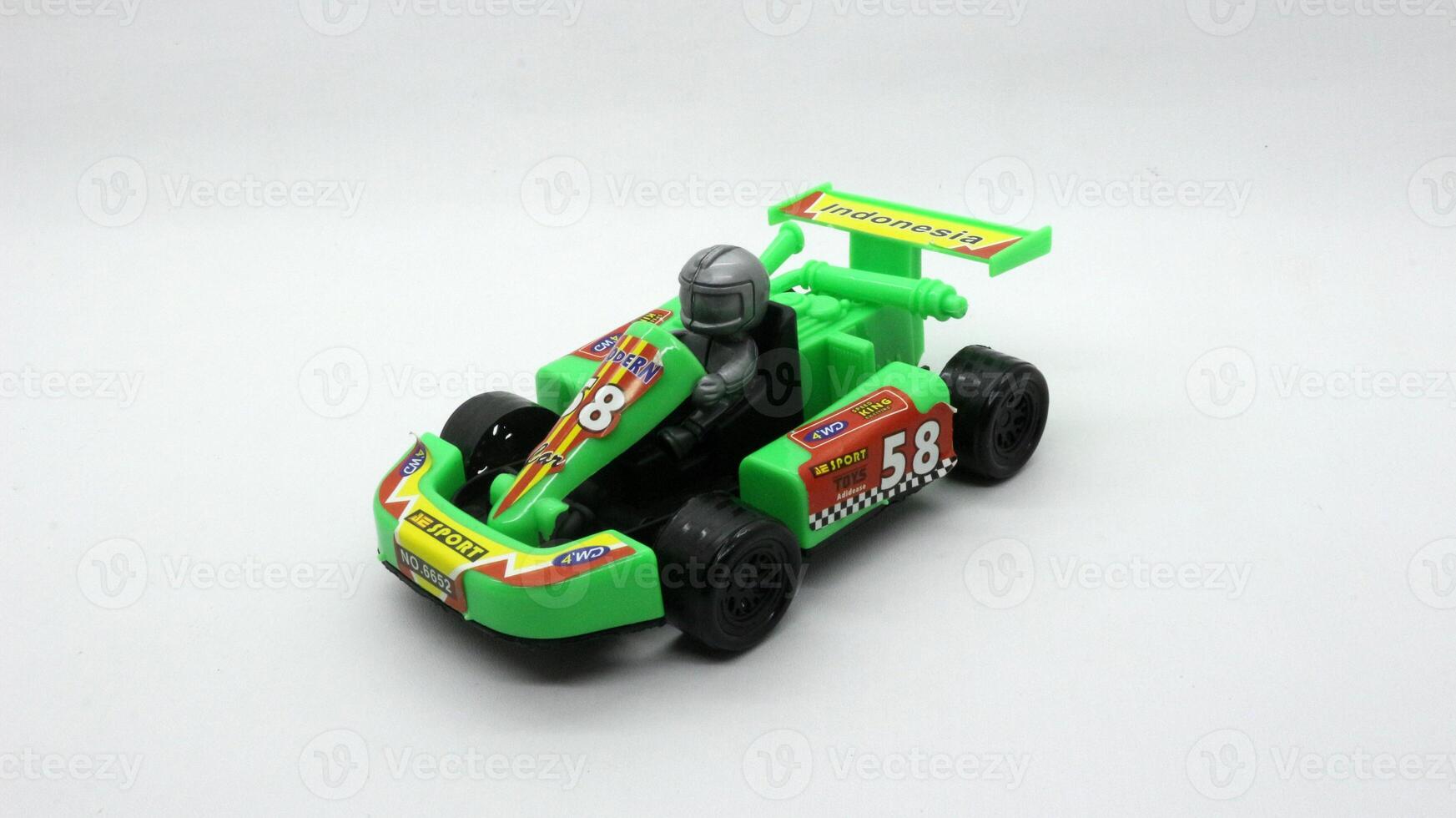 1. F1 car toy isolated on white background photo