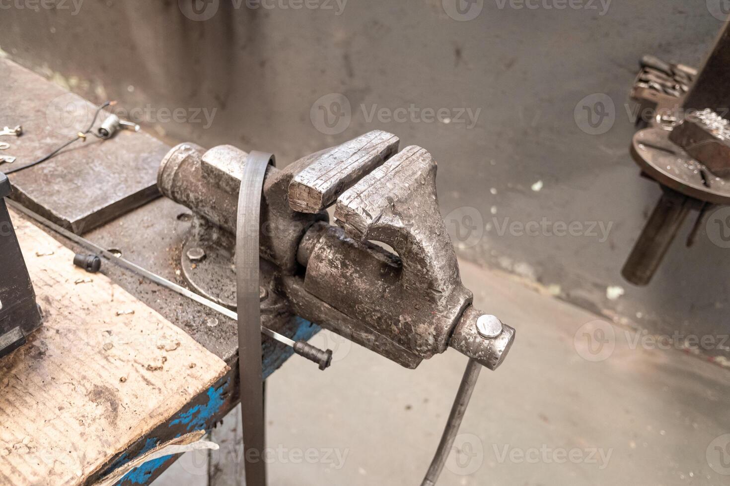 close view of a traditional workshop vise detail of an industrial vise in a workshop setting photo