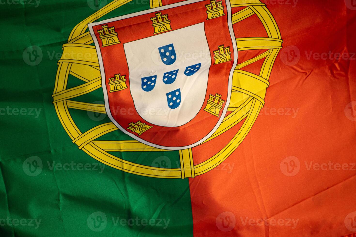 close view of the green and red portuguese flag detail of the flag of portugal photo