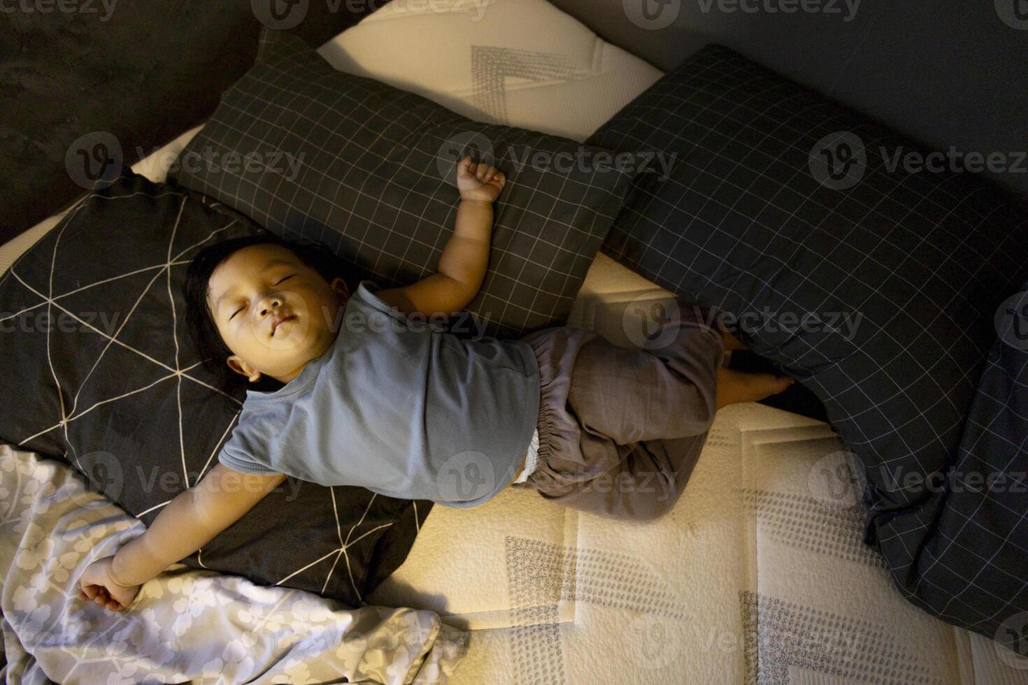 Toddler Taking Nap Time, Background for advertising and wallpaper in relaxion and lifestyle scene. photo