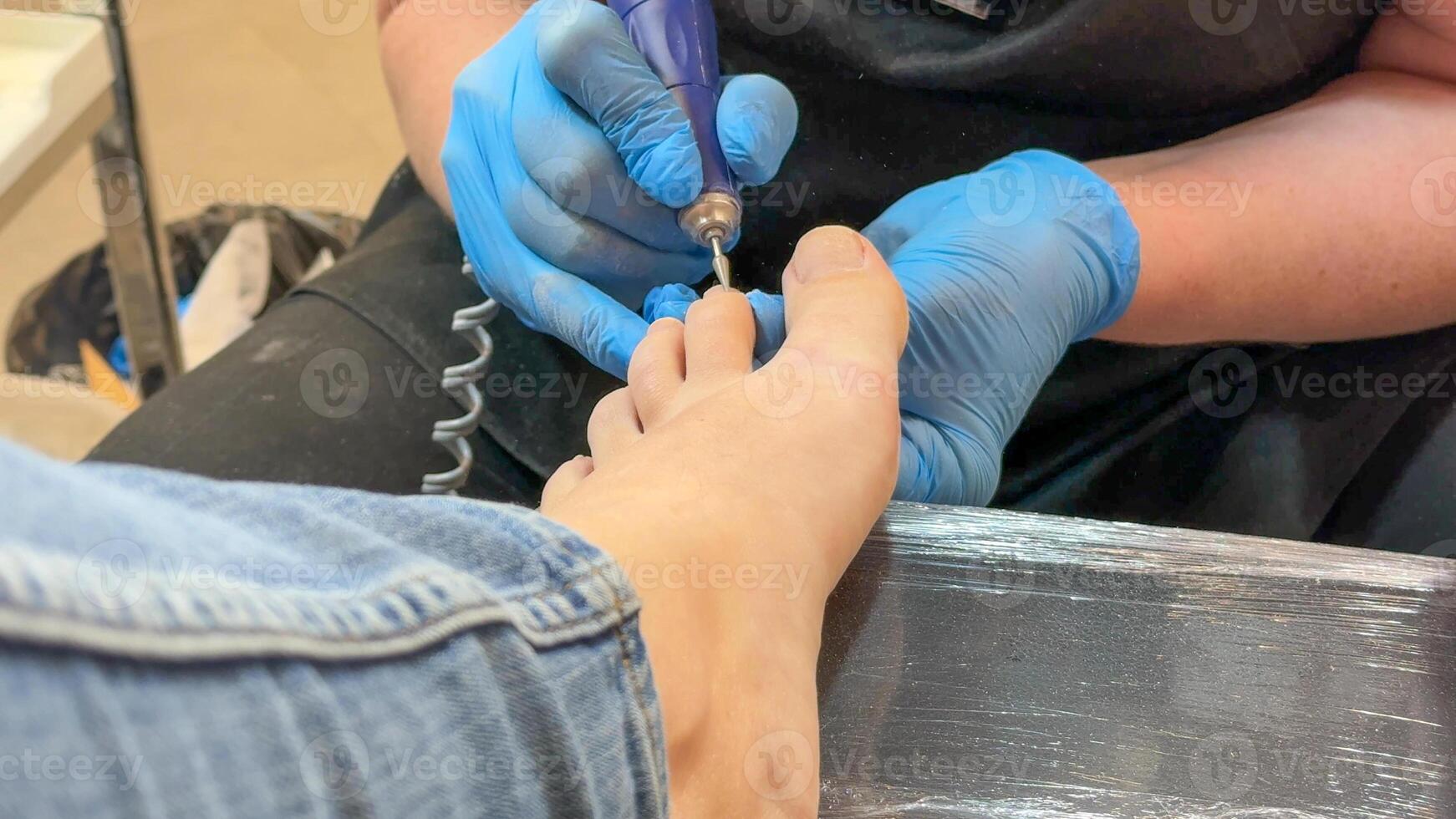 Caucasian woman receiving a pedicure at a salon, spa treatment self care concept, relaxation and beauty routine photo