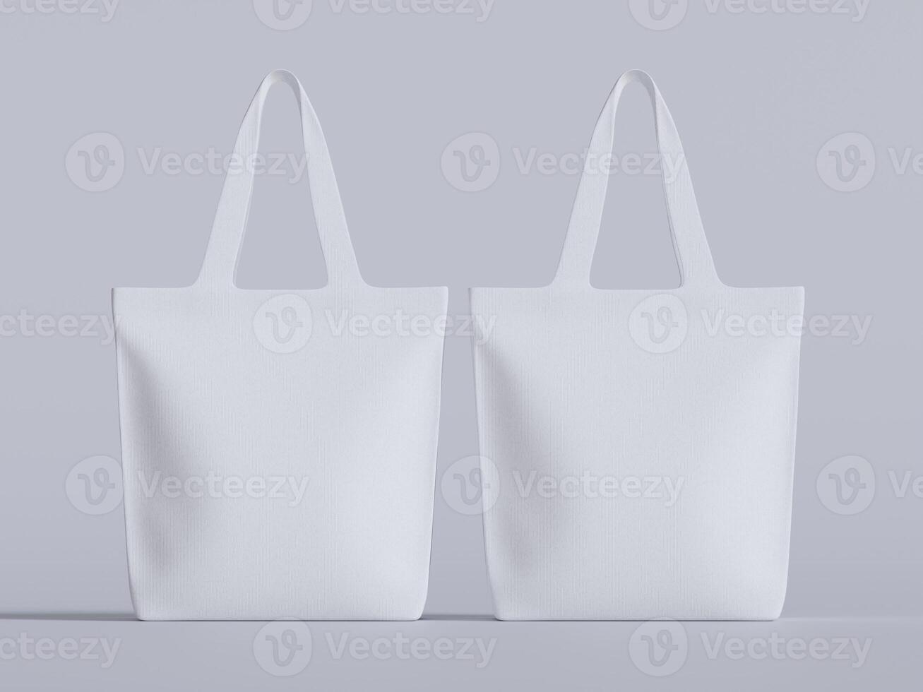 Two white tote bags placed side by side in perfect symmetry, in front of a very light lavender-gray backdrop. photo