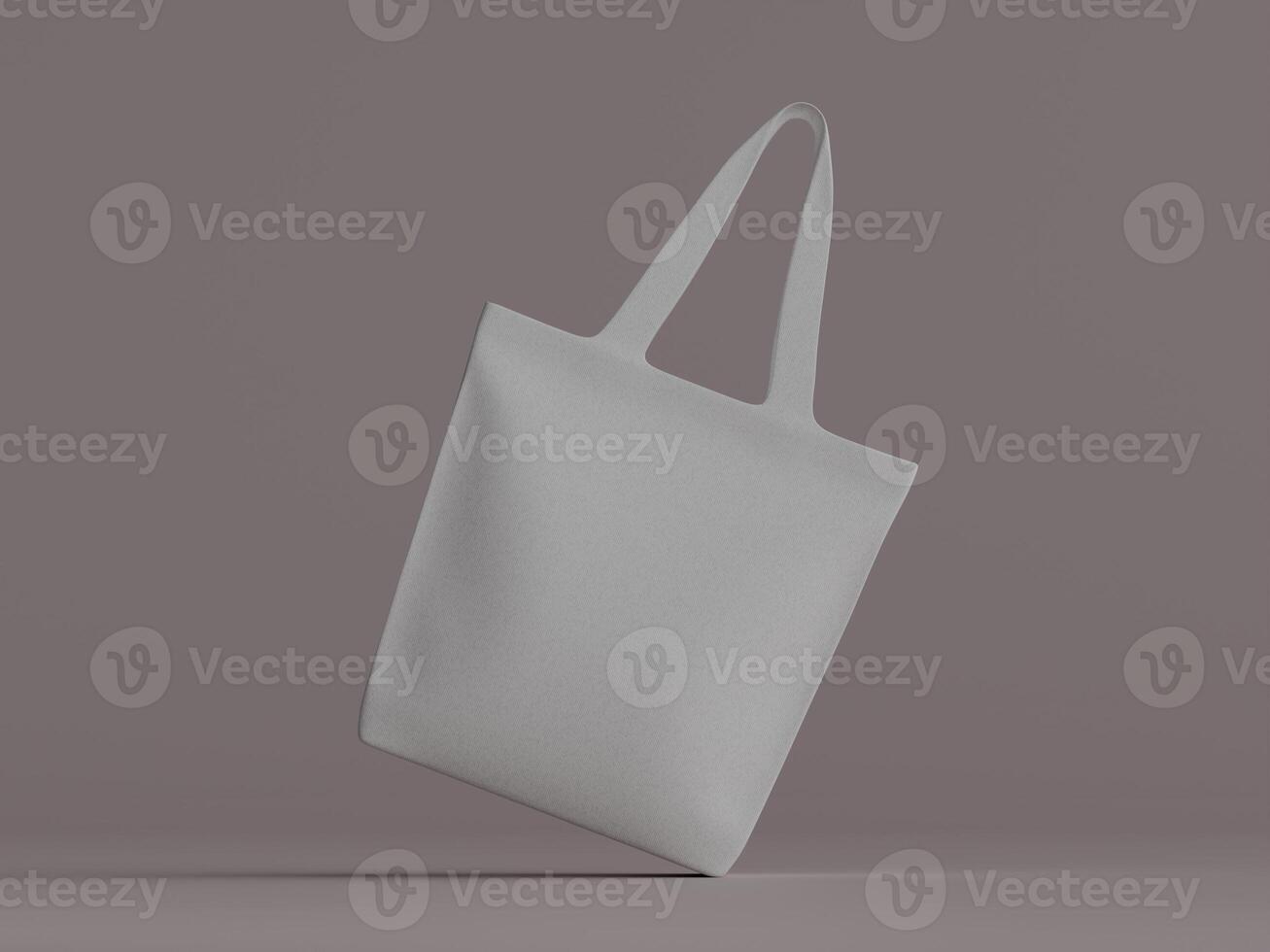 A white tote bag suspended with a slight lean, placed against a muted mauve-gray background. photo