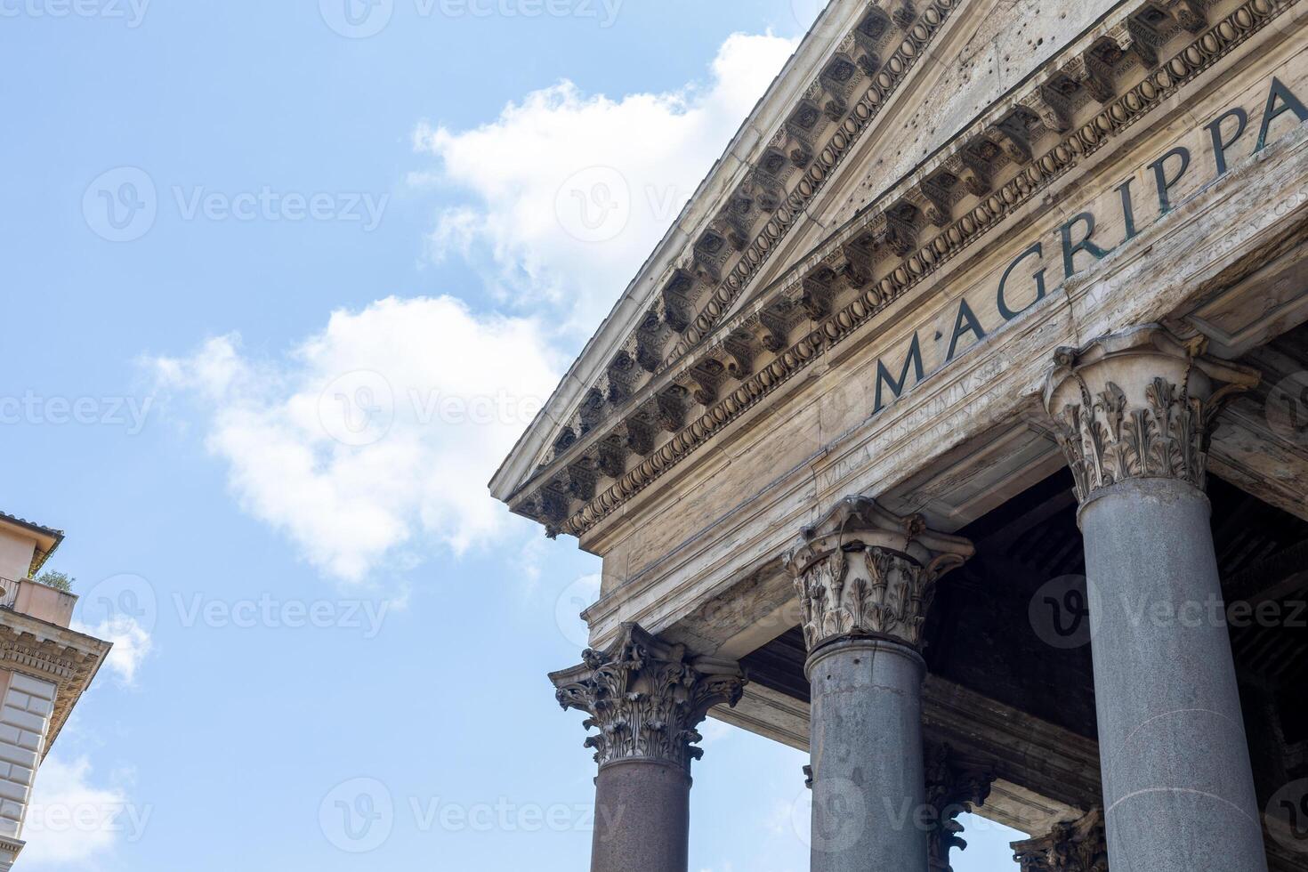 Exploring ancient architecture at the Pantheon in Rome under a bright blue sky photo