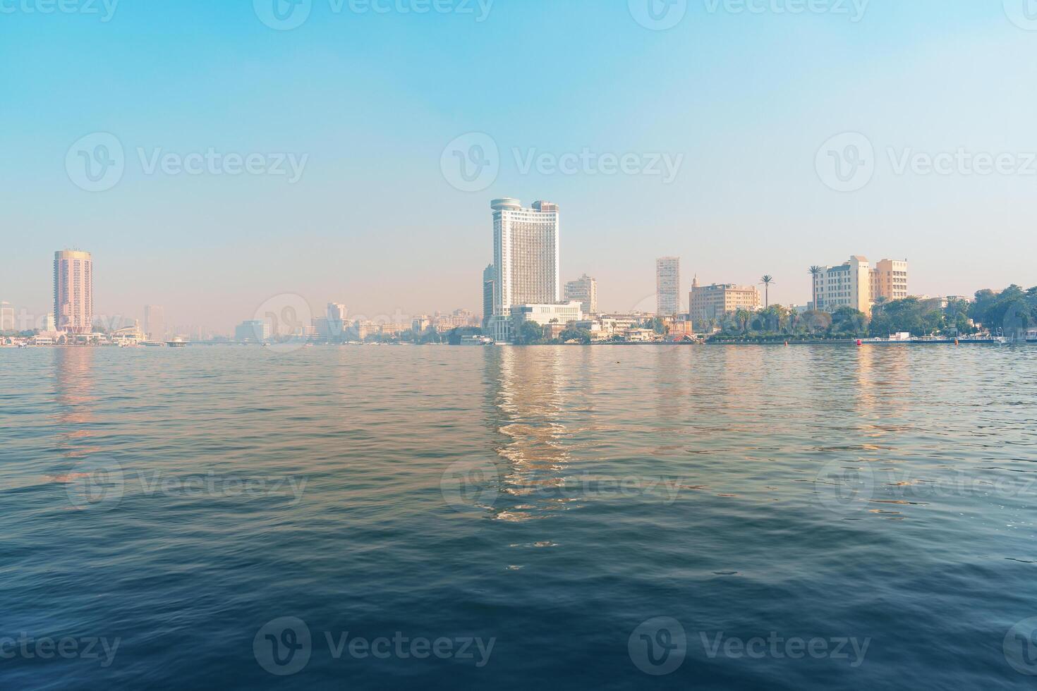 Expansive view of the Nile River with Cairo skyline on a clear day photo