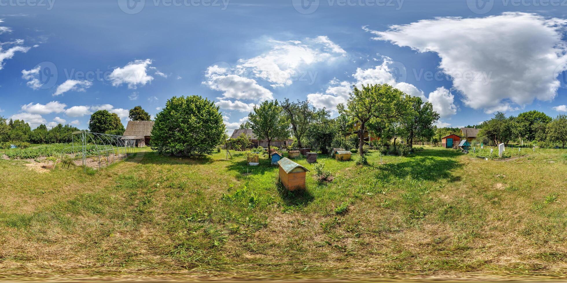 360 hdri panorama near apiary beehives of wooden home or homestead building in forest in abandoned village in full seamless spherical equirectangular projection, ready AR VR virtual reality content photo