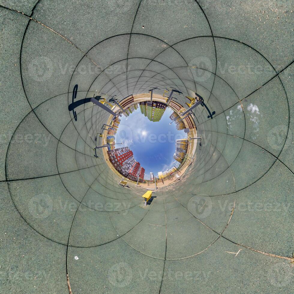 A skateboarder is riding in a circular tunnel photo