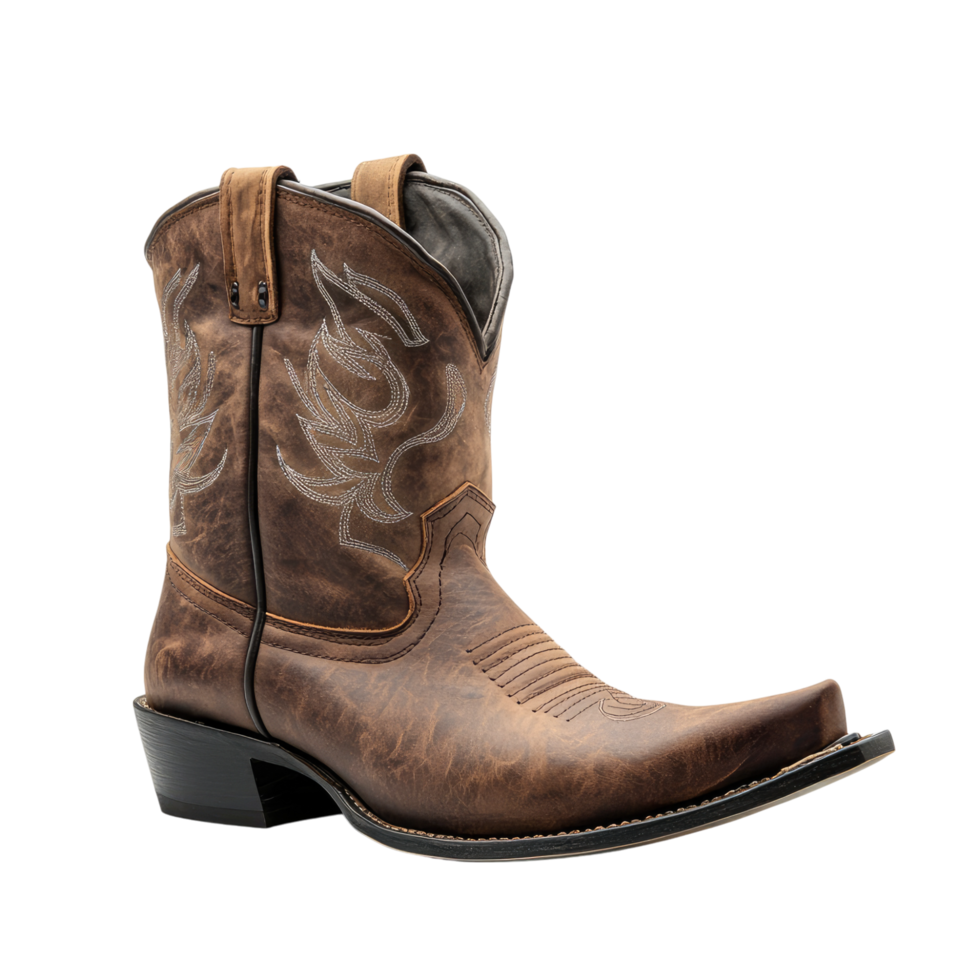 a brown cowboy boot with a black sole and a white design png