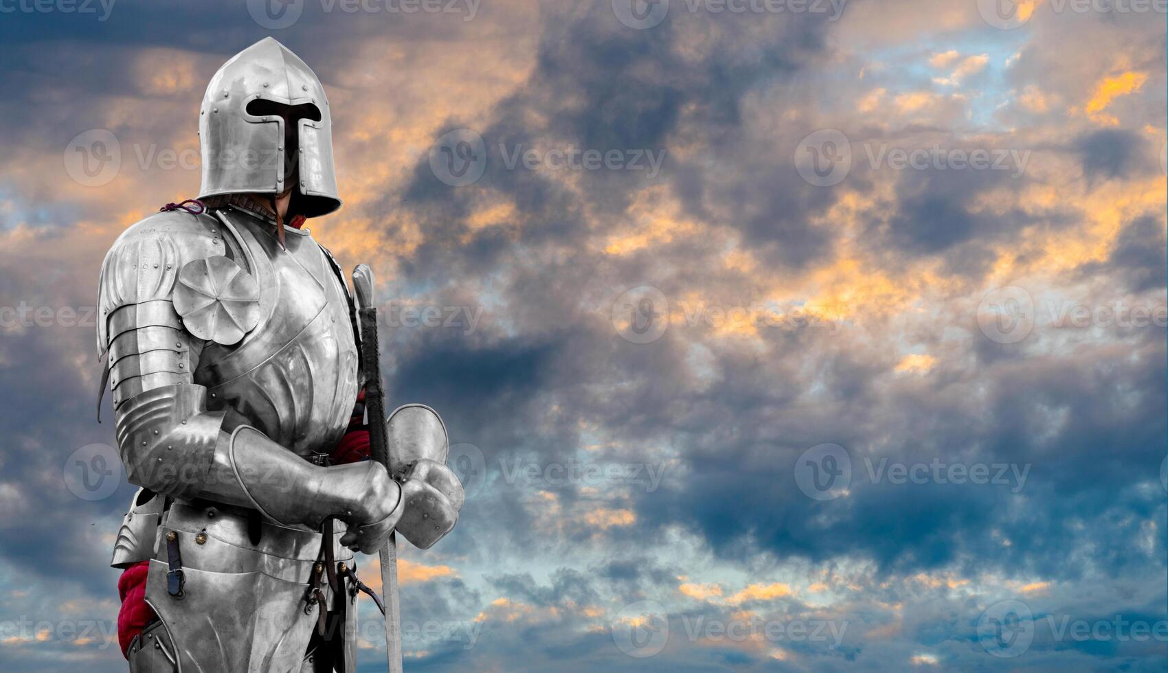 A knight in shiny metal armor. Reliable protection and insurance. A symbol of stability and reliability. photo