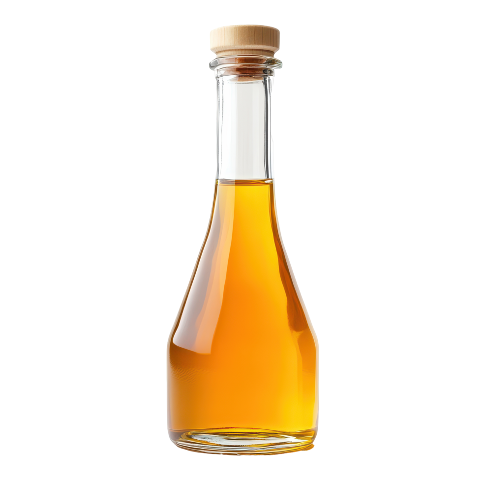 Clear glass bottle filled with golden liquid sits on a neutral surface in bright light png