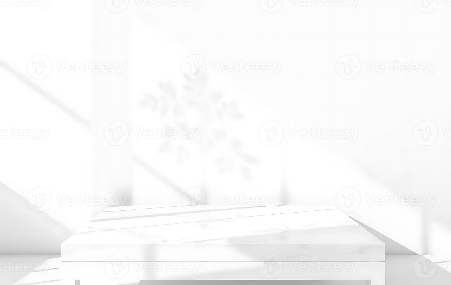 White Minimalist Marble Tabletop Display with Sunlight and Leaf Shadows photo