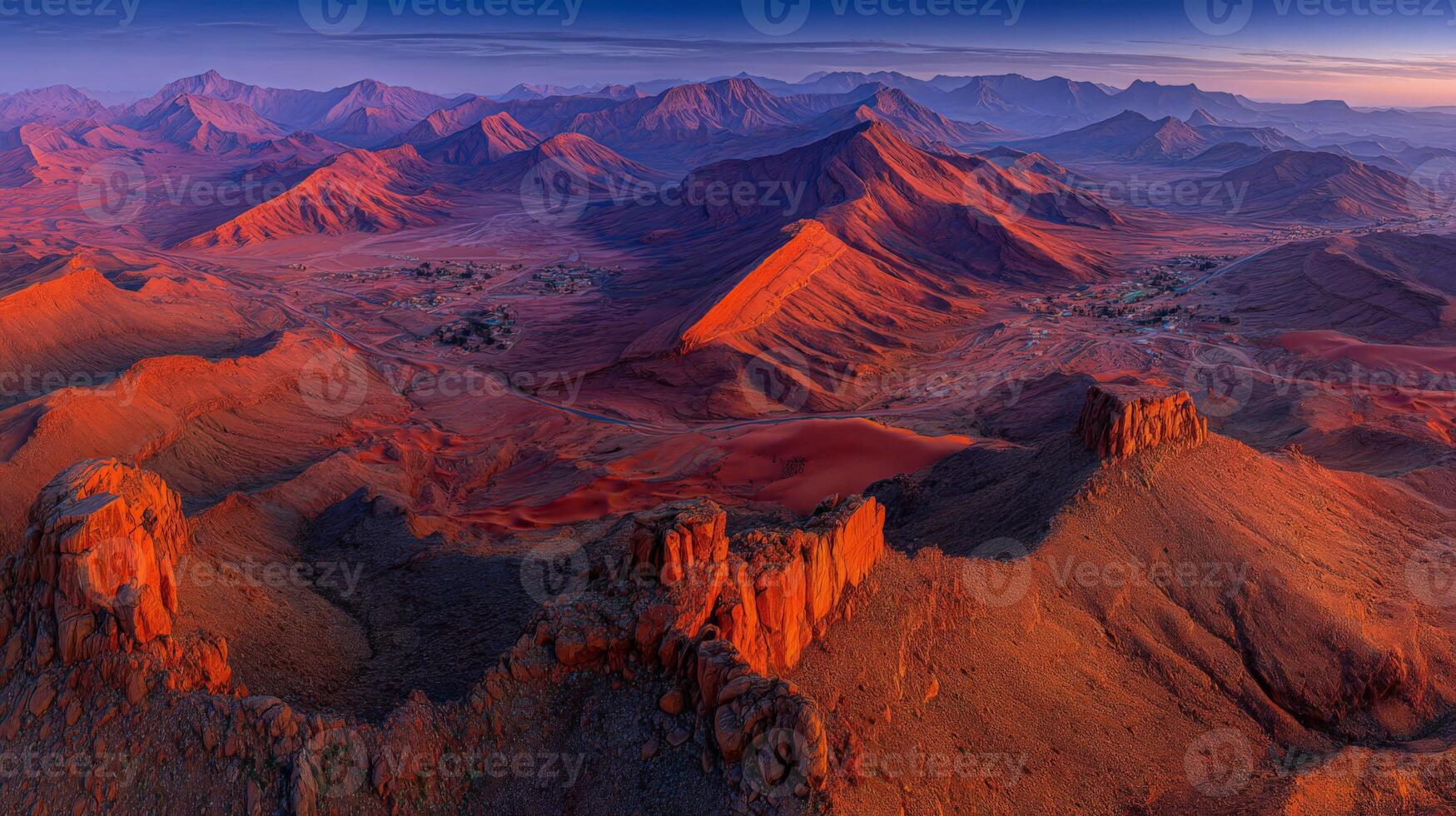 Panoramic Sunset View of Red Desert Mountains and Sand Dunes photo