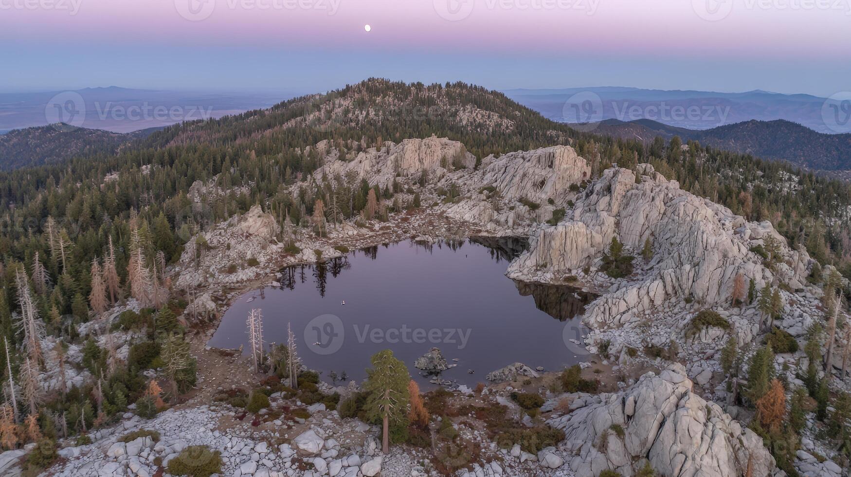 Serene Mountain Lake at Dusk with Full Moon photo