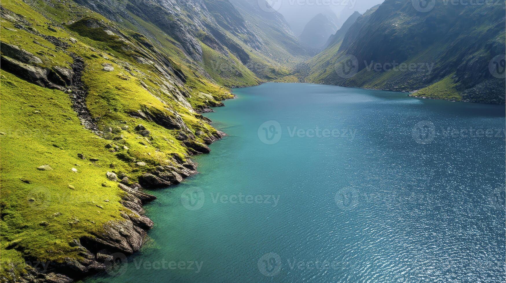 Aerial View Of Azure Lake In Mountain Valley photo