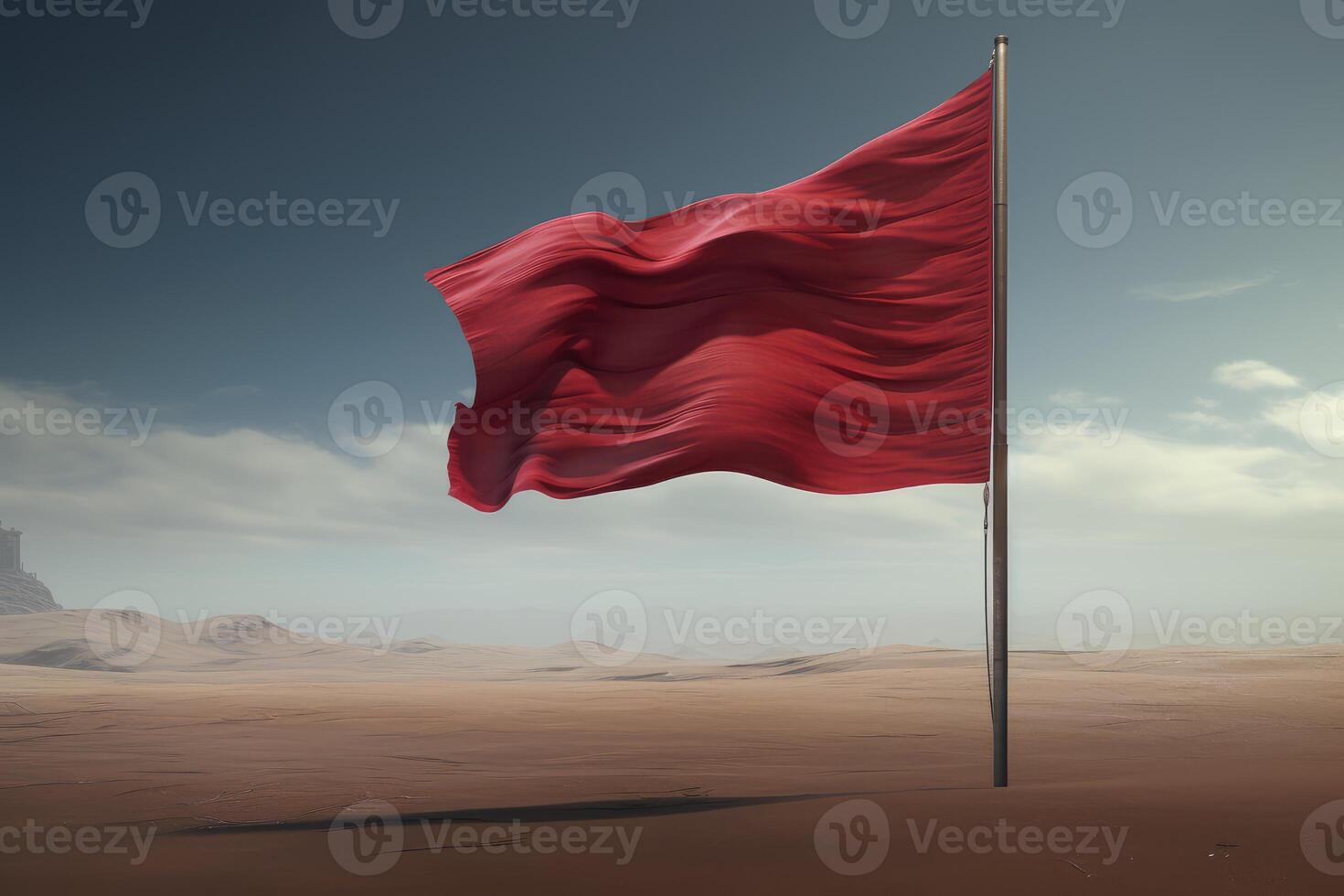 Red flag waving in the desert wind symbolizing revolution or danger photo
