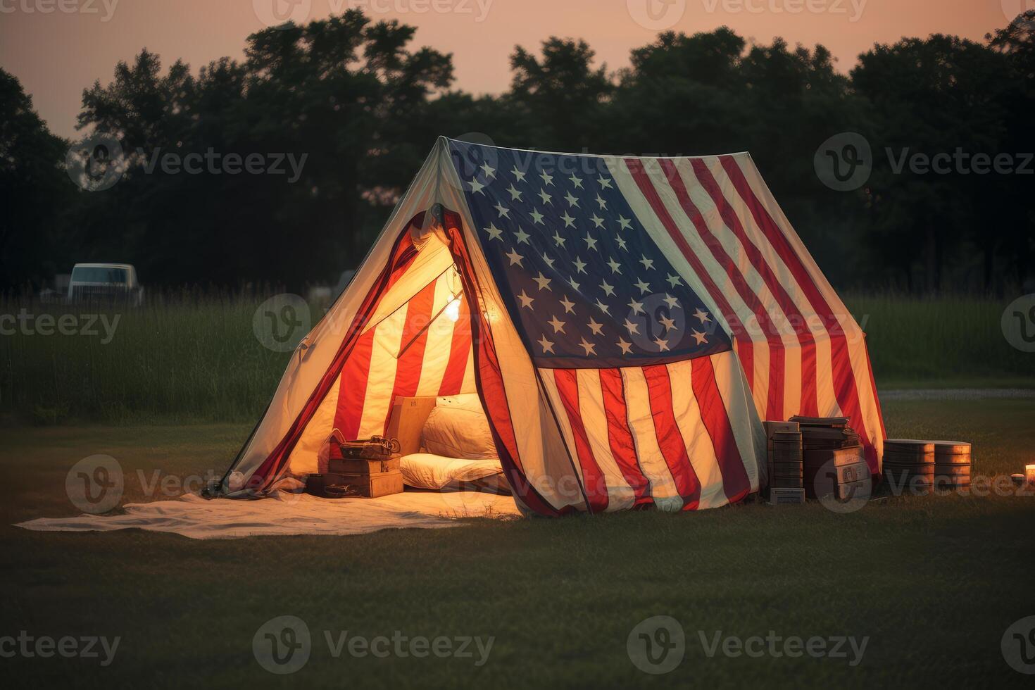 Camping tent decorated with american flag at dusk in the countryside photo