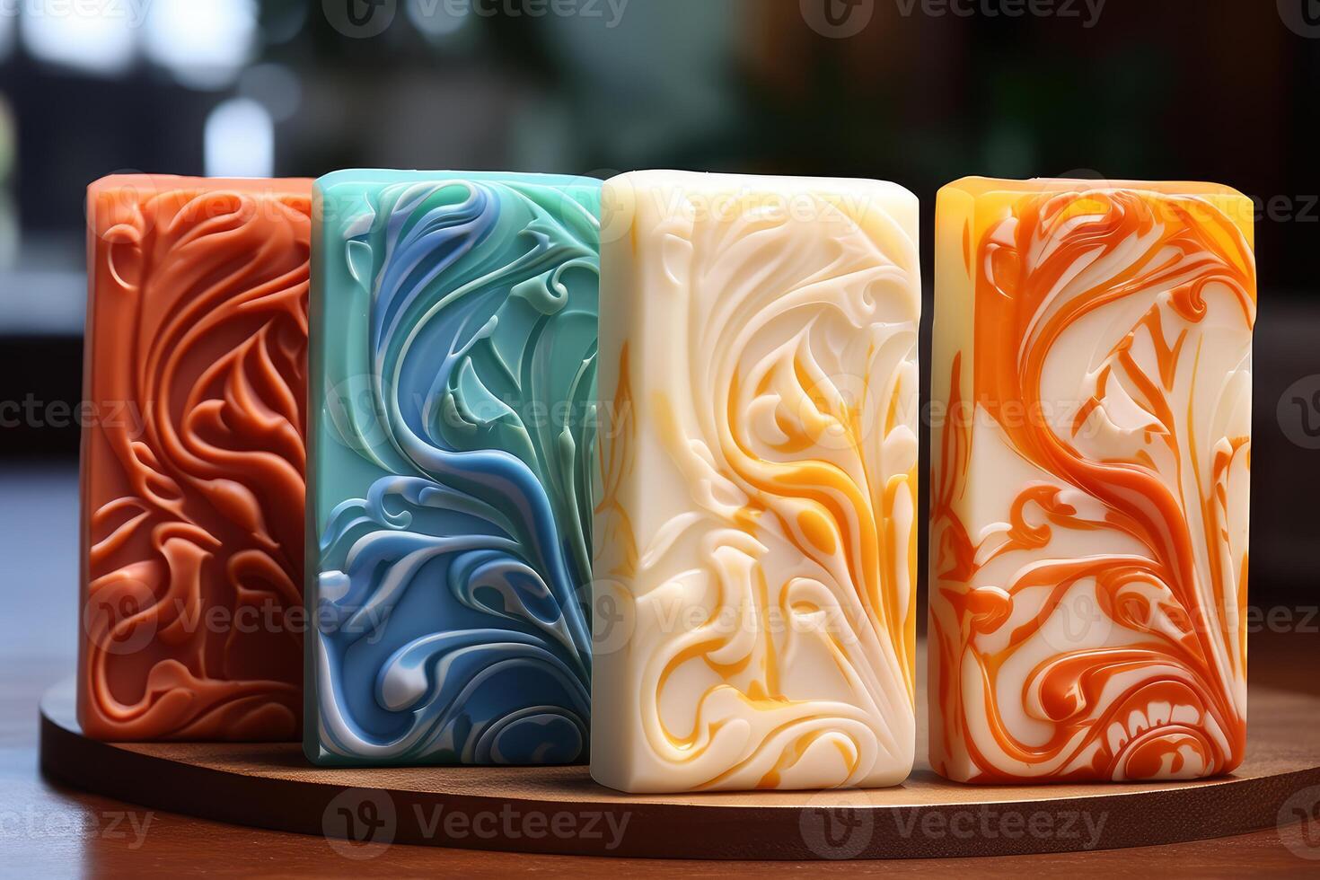 Colorful bars of soap with floral design resting on wooden surface photo