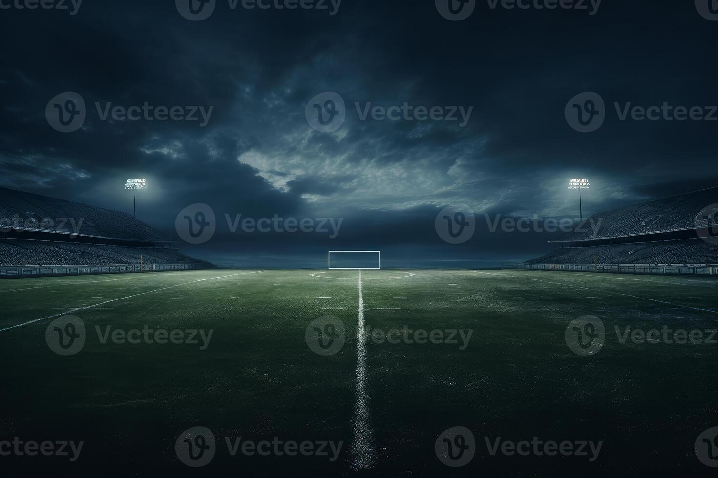 Dramatic football stadium at night with illuminated goal post under stormy sky photo