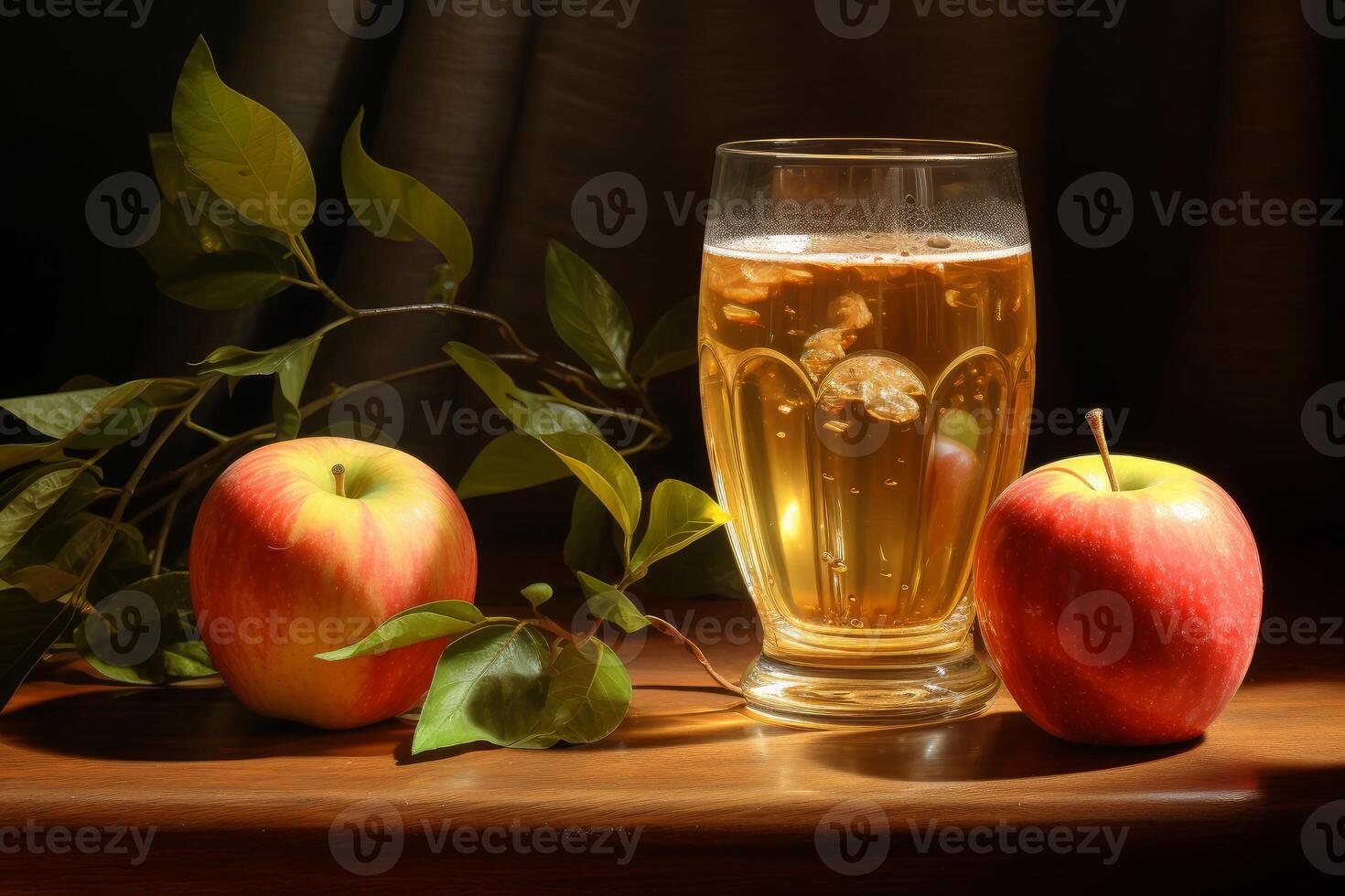 Glass of apple juice with apples and apple branch on wooden table photo