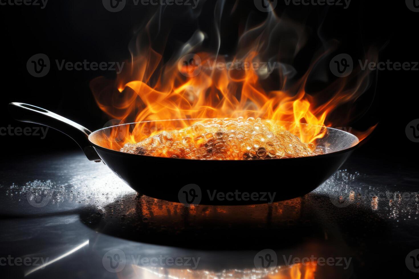 Wok pan with burning oil and high flames cooking on a black background photo