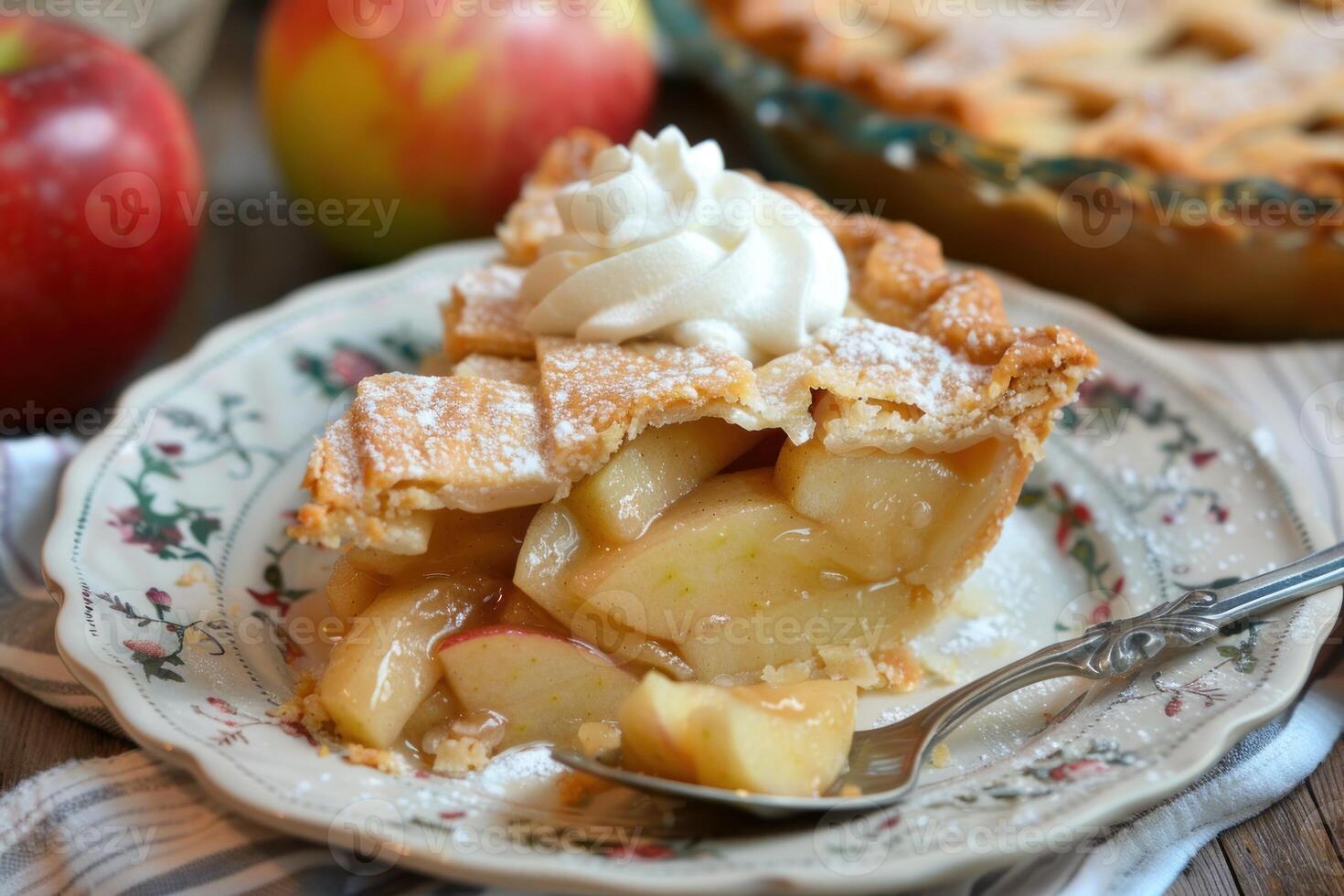 Delicious slice of freshly baked apple pie with whipped cream topping photo