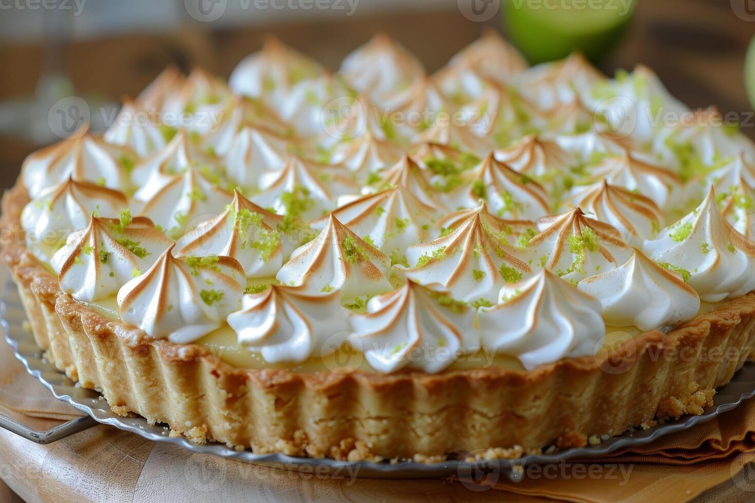 Delicious key lime pie showing meringue topping and lime zest photo