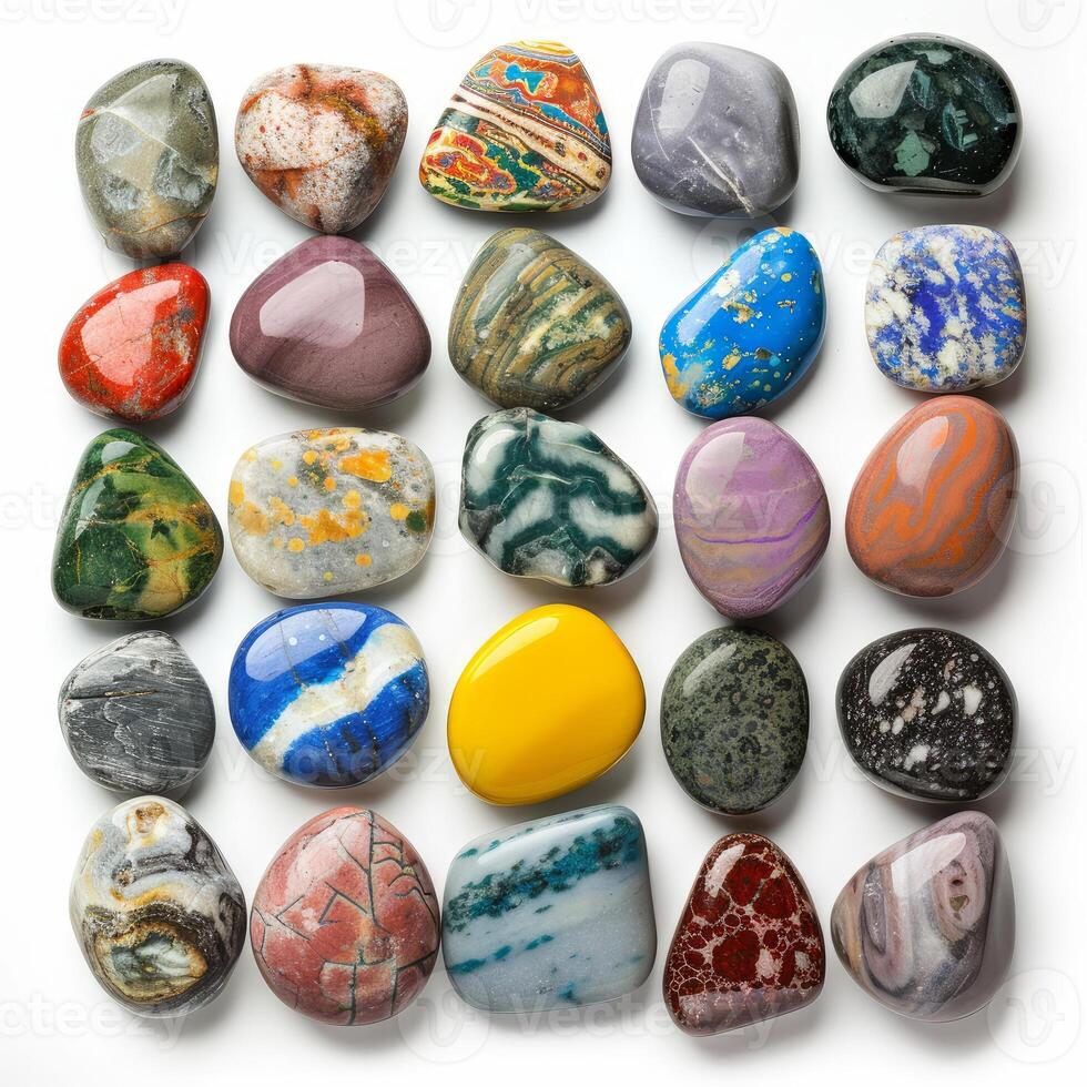 Colorful polished gemstones forming a square on white background photo