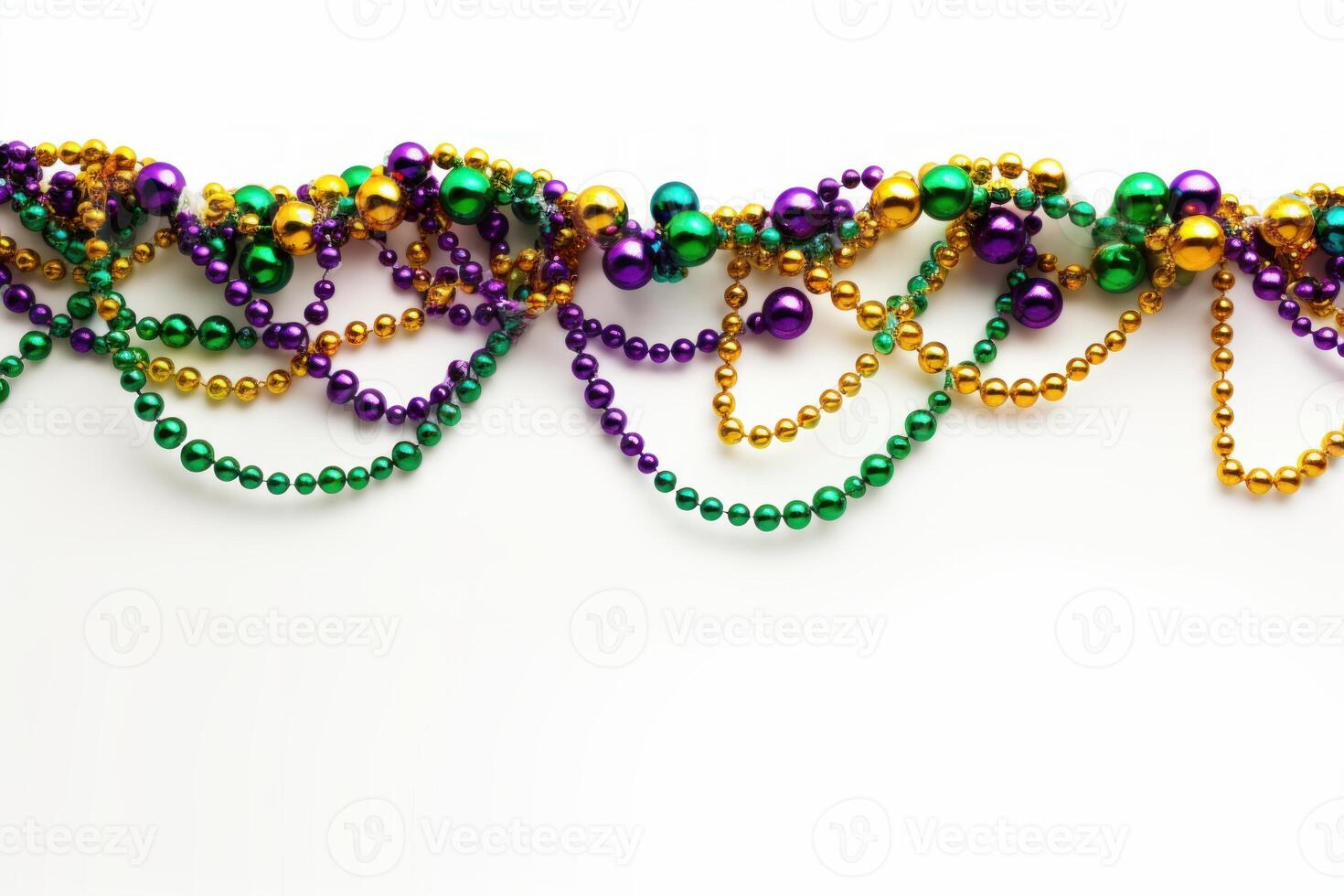 Mardi gras beads hanging on white background creating festive atmosphere photo
