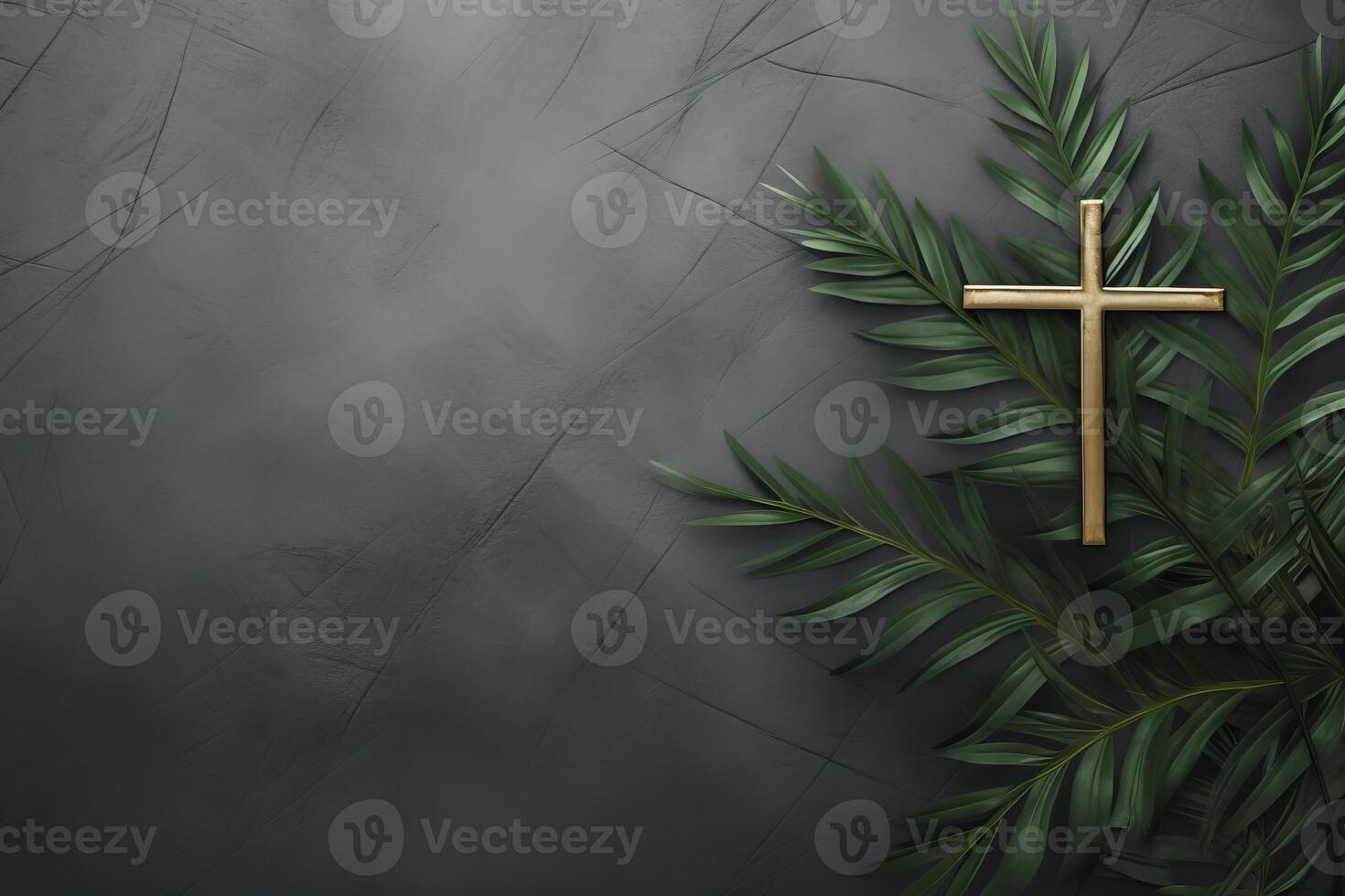 Golden christian cross resting on palm leaves against dark background photo