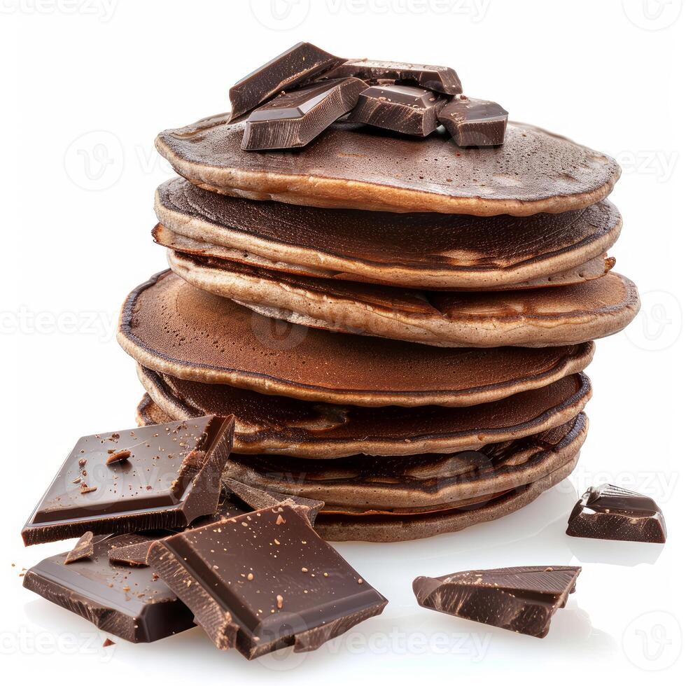 Stack of delicious chocolate pancakes with chocolate chunks on white background photo