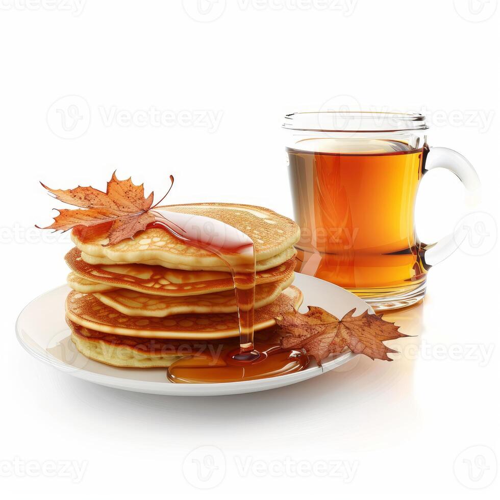 Stack of pancakes with maple syrup and autumn leaves accompanied by tea photo