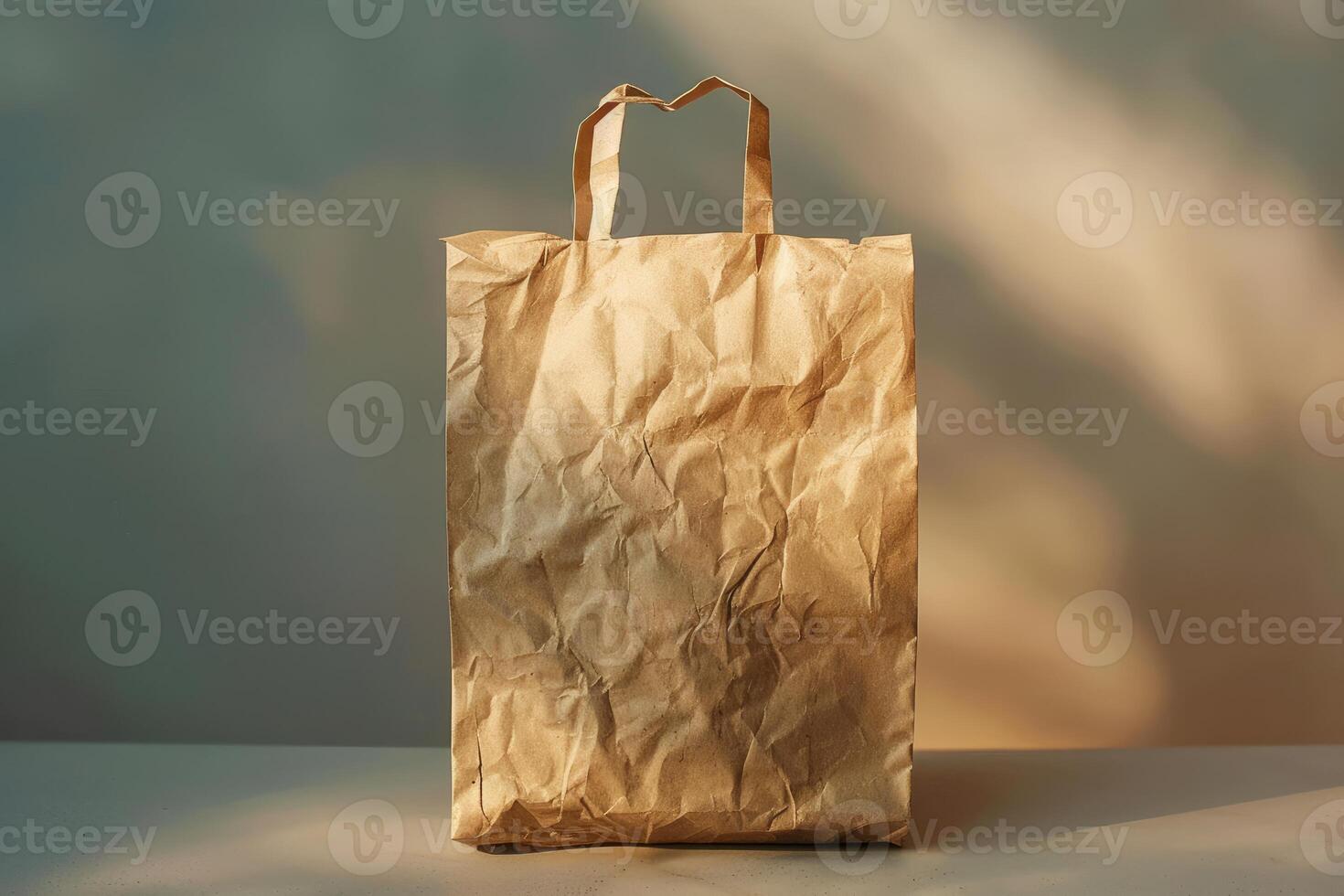 Crumpled brown paper bag standing on table with dramatic lighting photo