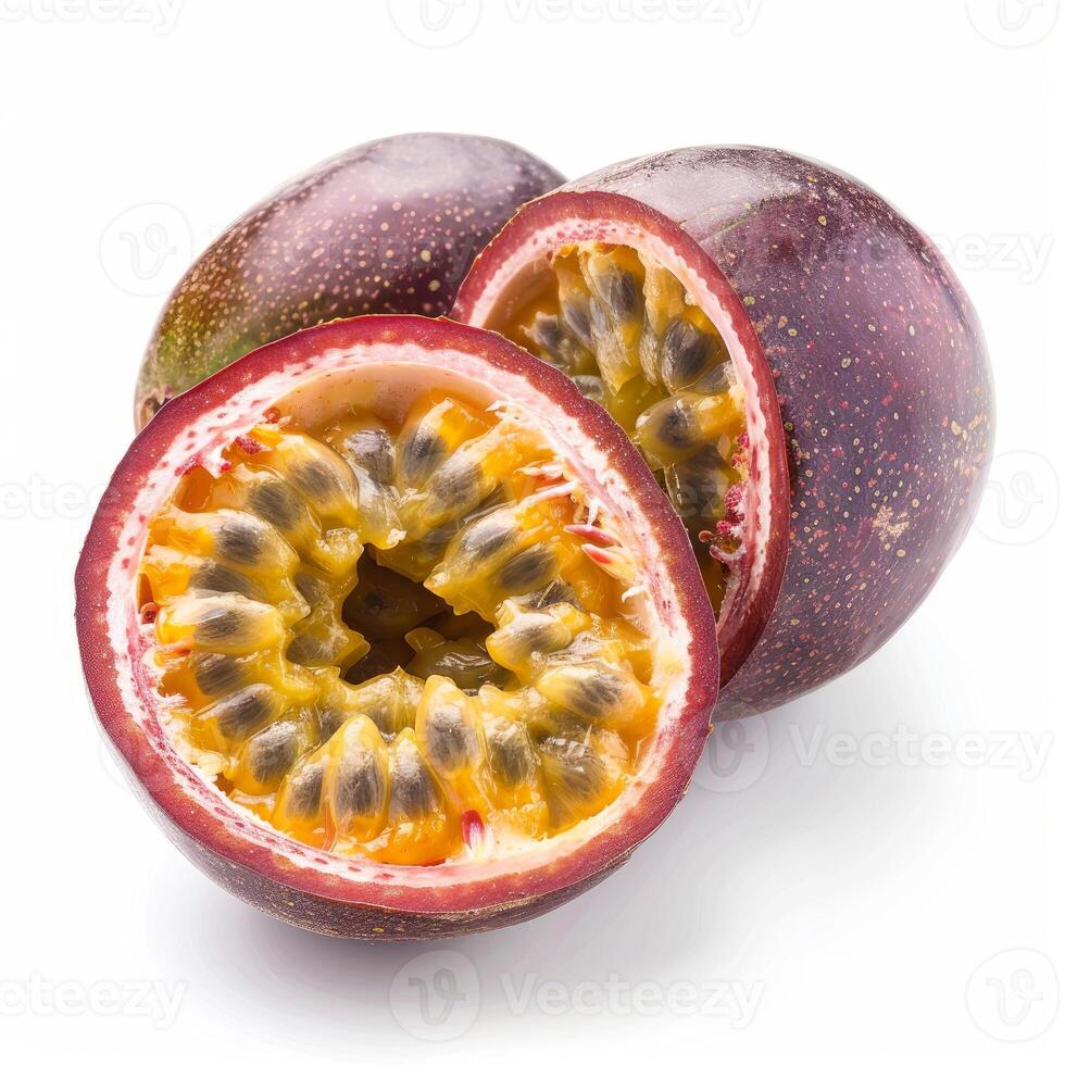 Fresh passion fruit showing ripe seeds and pulp on white background photo