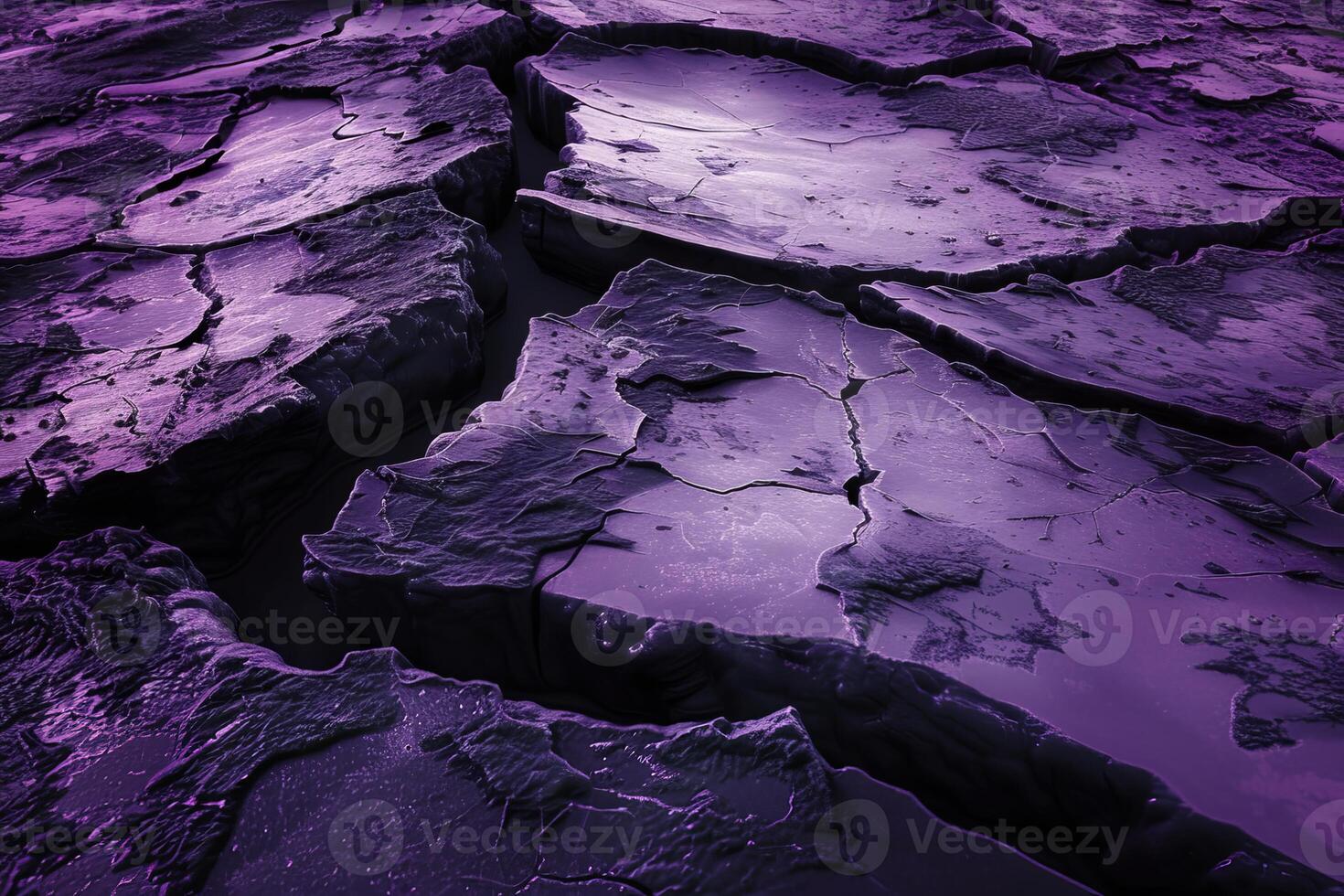 Cracked purple ground showing severe drought conditions photo