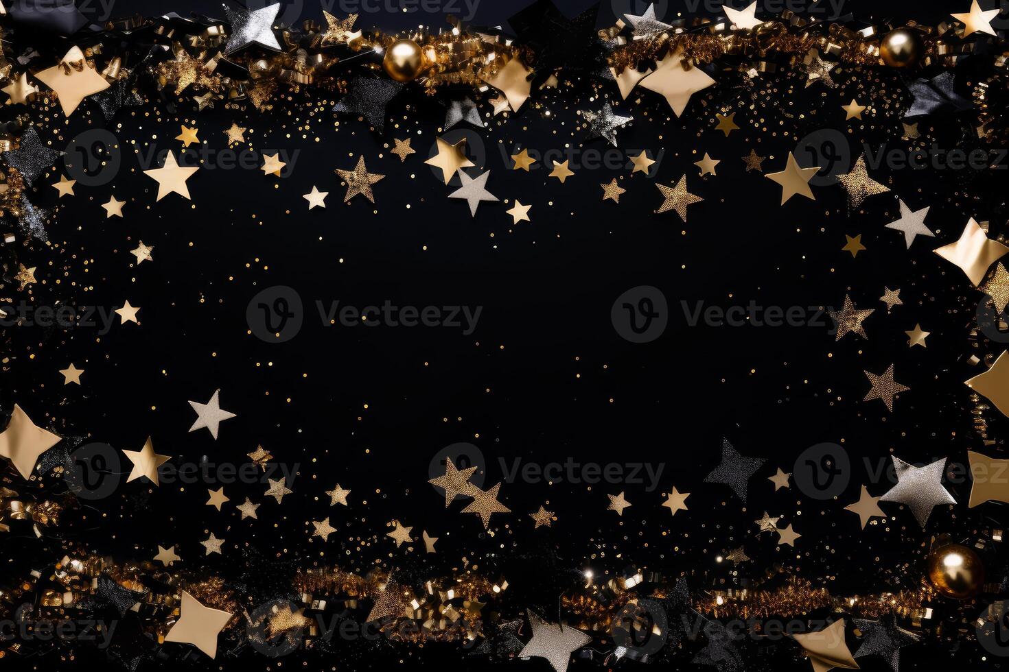 Golden and silver stars creating a sparkling frame on black background photo
