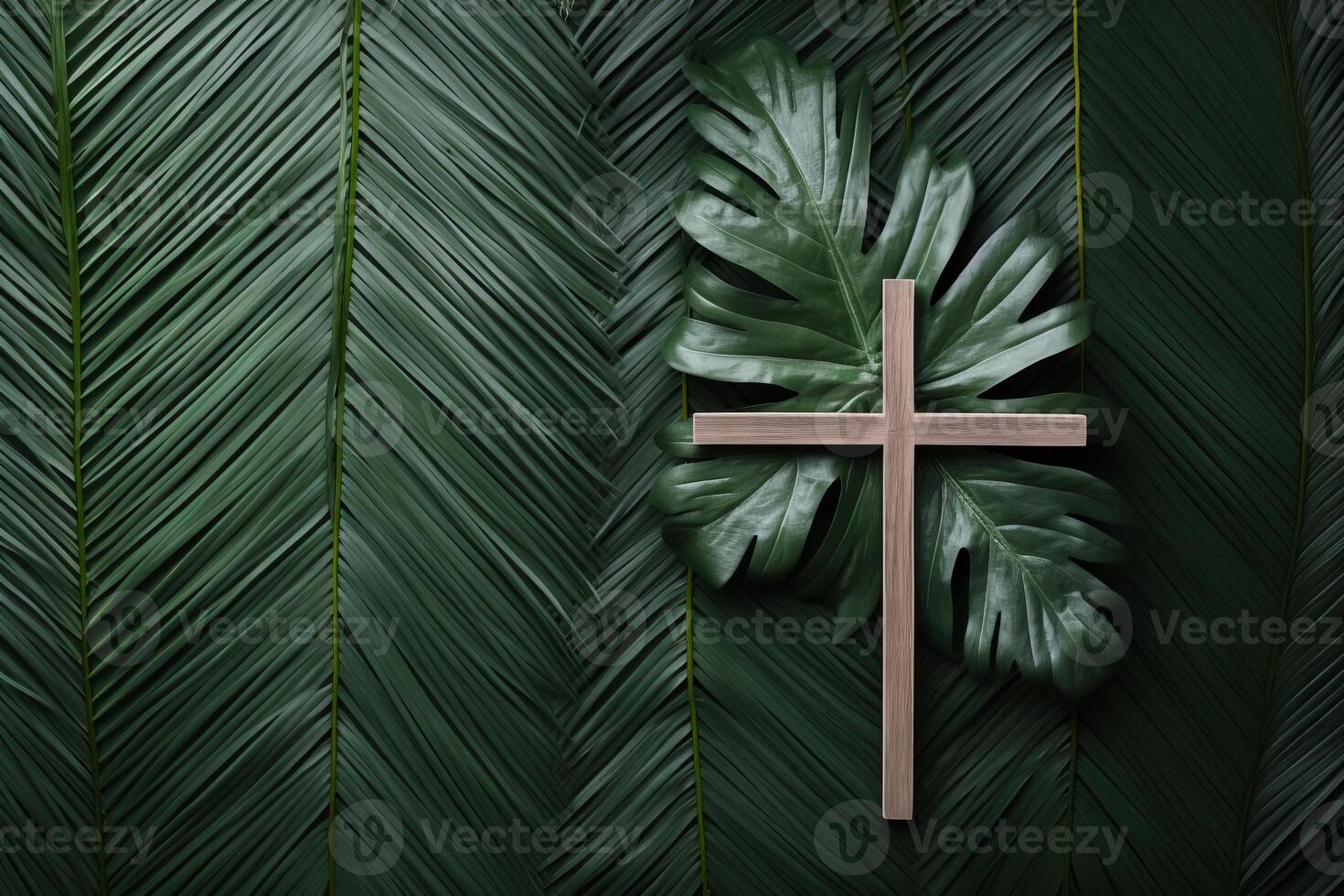 Wooden christian cross resting on tropical leaves symbolizing faith and nature photo