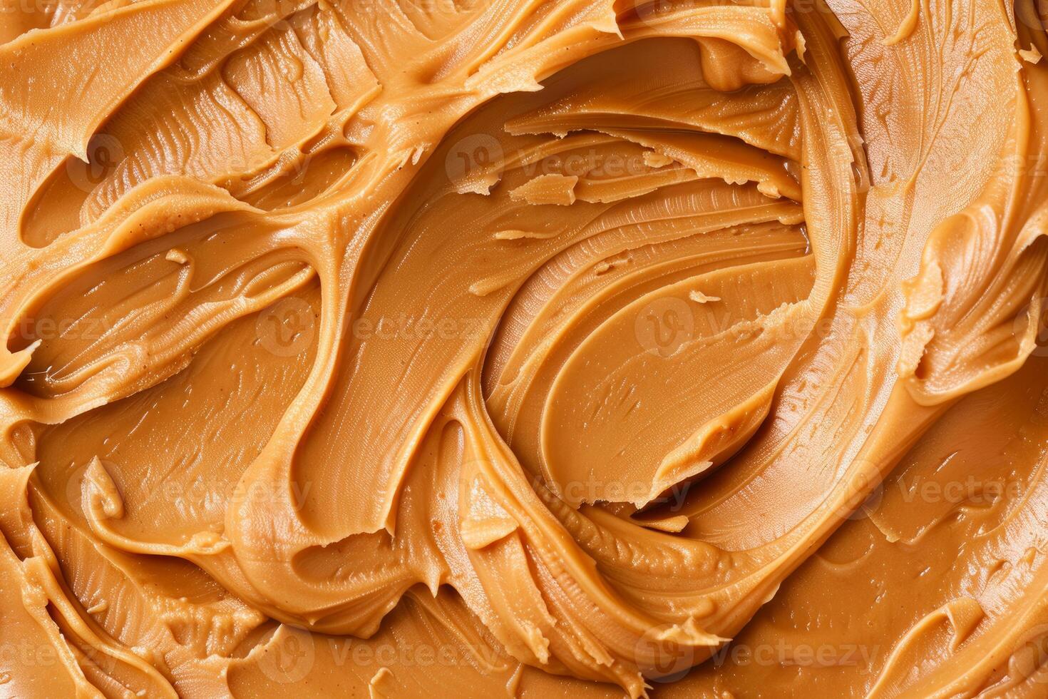 Creamy peanut butter swirls creating delicious texture background photo